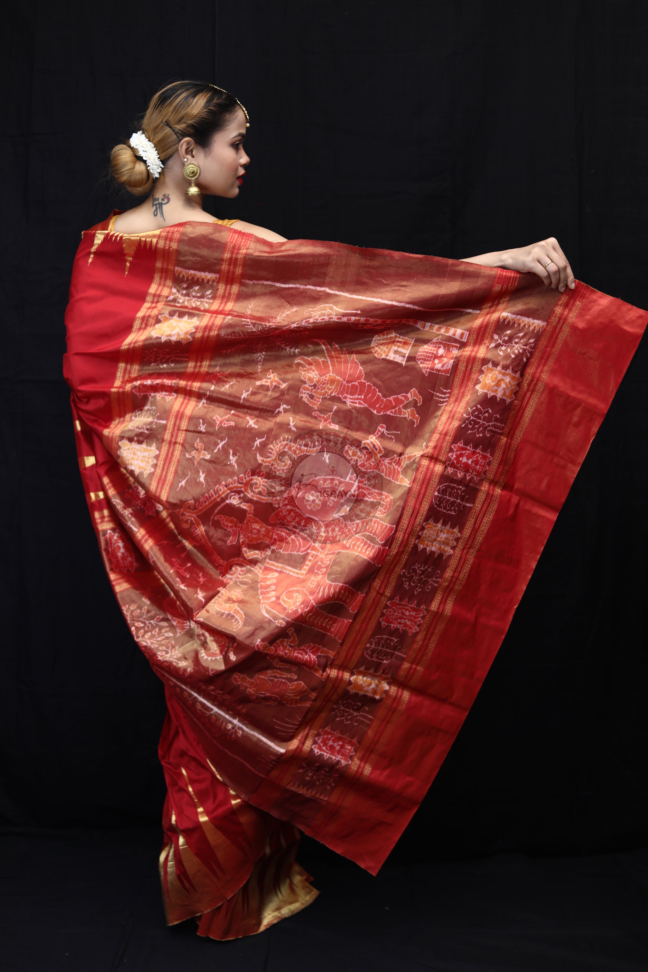 "Odisha Handloom Tissue Silk Saree with shimmering texture, elegant zari border, and lightweight drape, handcrafted by artisans"