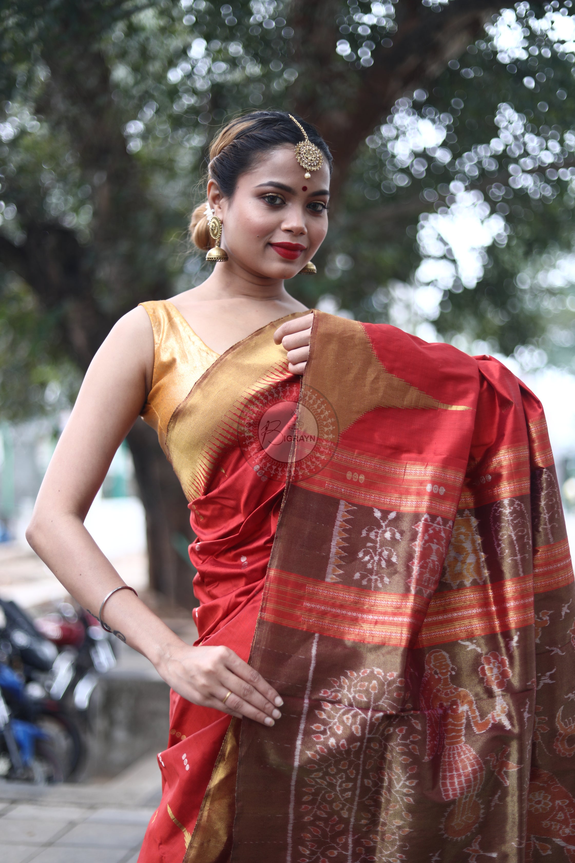 "Odisha Handloom Tissue Silk Saree with shimmering texture, elegant zari border, and lightweight drape, handcrafted by artisans"