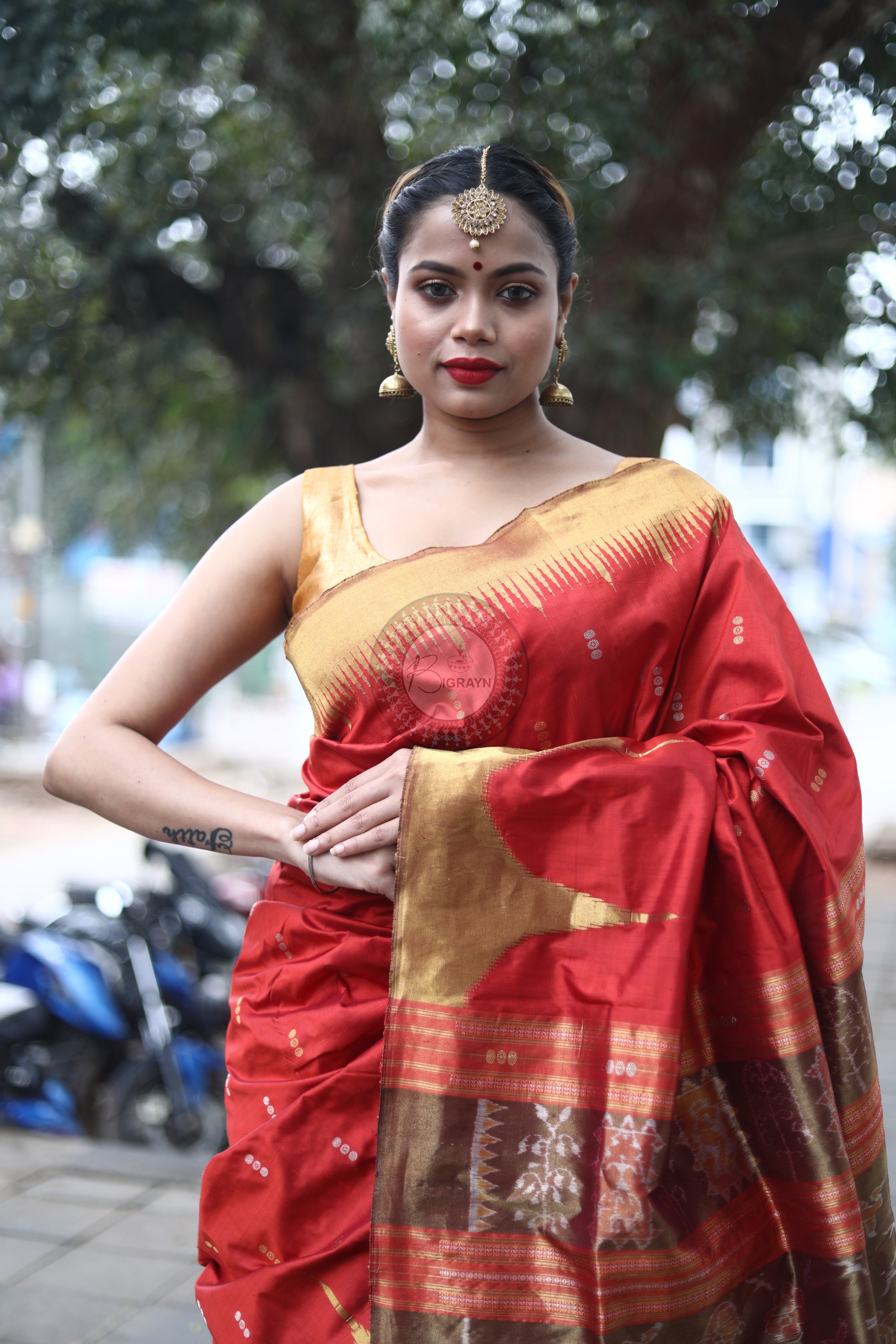 "Odisha Handloom Tissue Silk Saree with shimmering texture, elegant zari border, and lightweight drape, handcrafted by artisans"