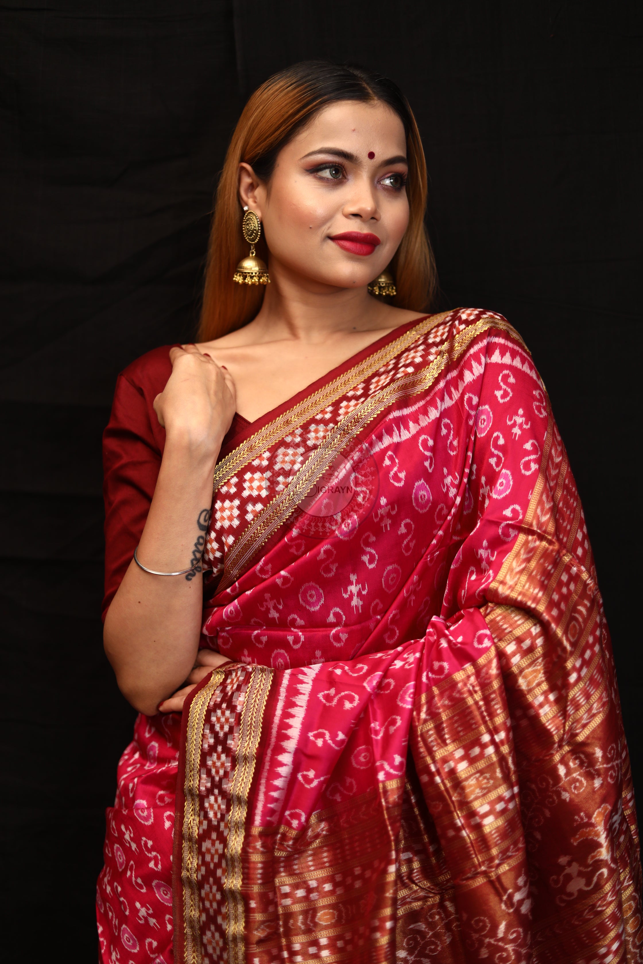 "Odisha Handloom Tissue Silk Saree with shimmering texture, elegant zari border, and lightweight drape, handcrafted by artisans"