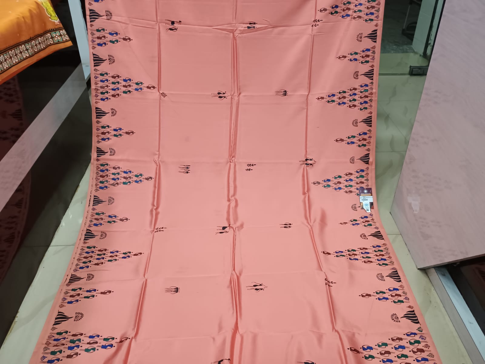 Peach Tribal Konark Wheel Theme Pattachitra Khadi Silk Saree