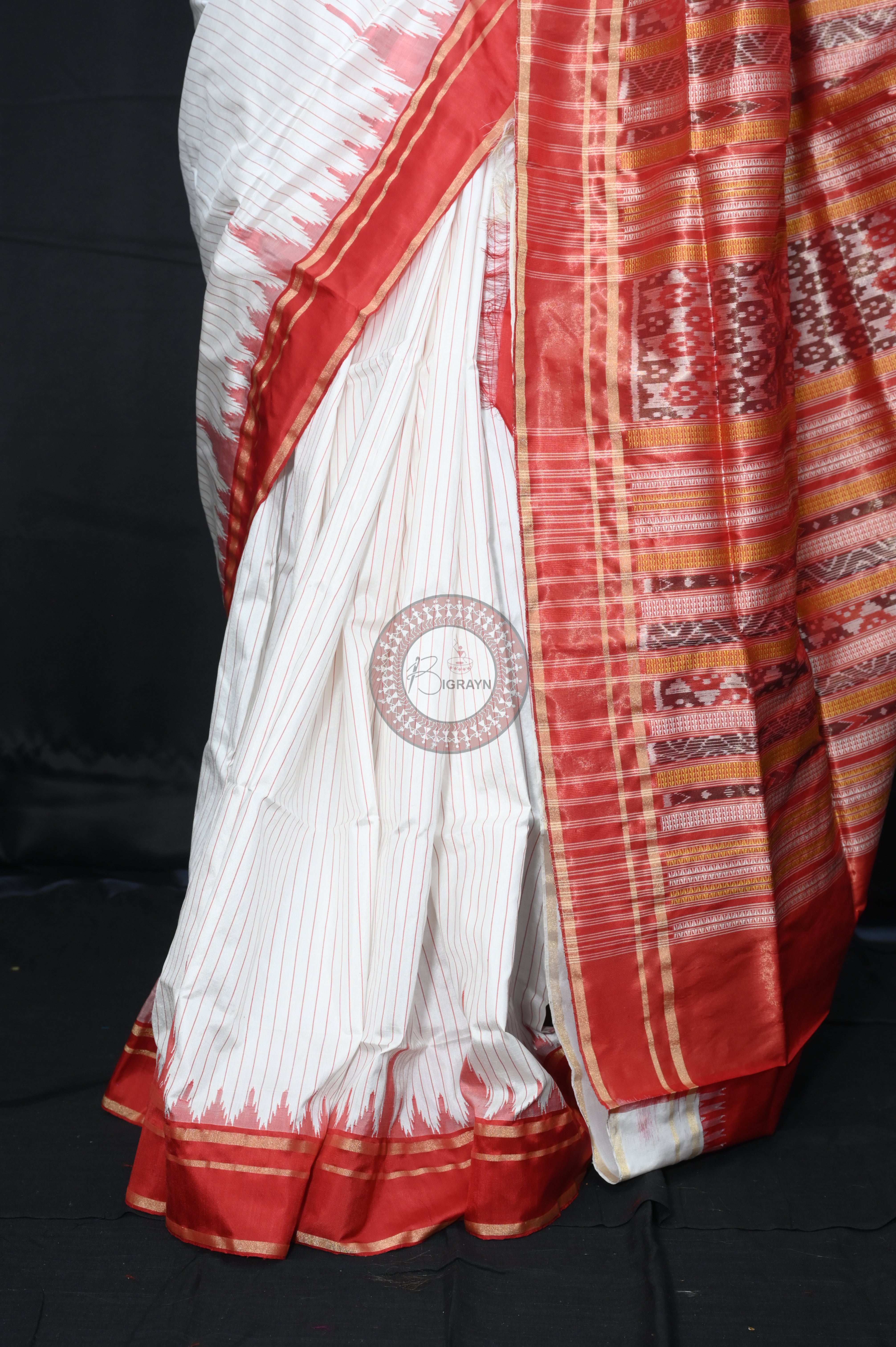 "Odisha Handloom Tissue Silk Saree with shimmering texture, elegant zari border, and lightweight drape, handcrafted by artisans"
