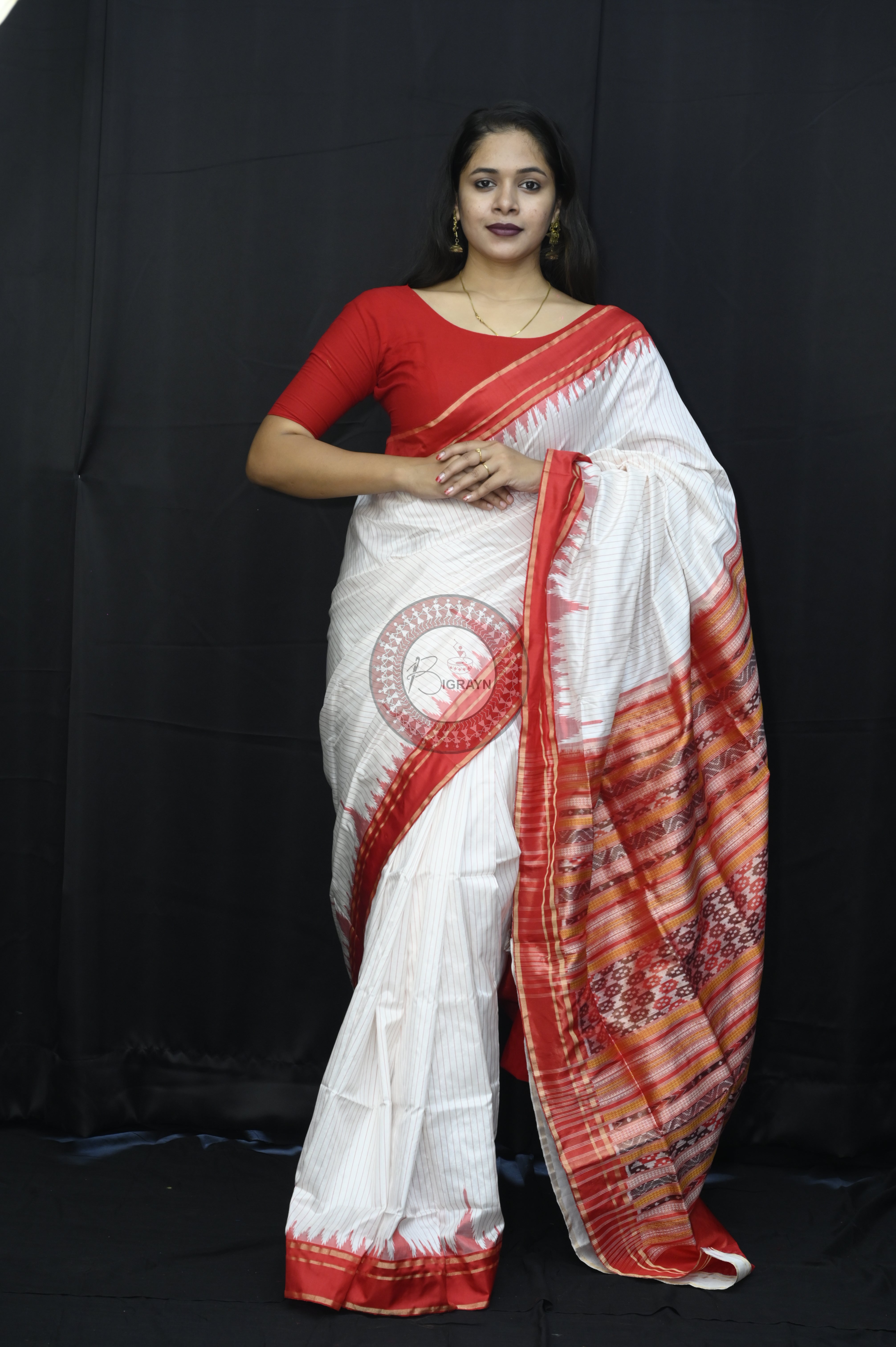 "Odisha Handloom Tissue Silk Saree with shimmering texture, elegant zari border, and lightweight drape, handcrafted by artisans"