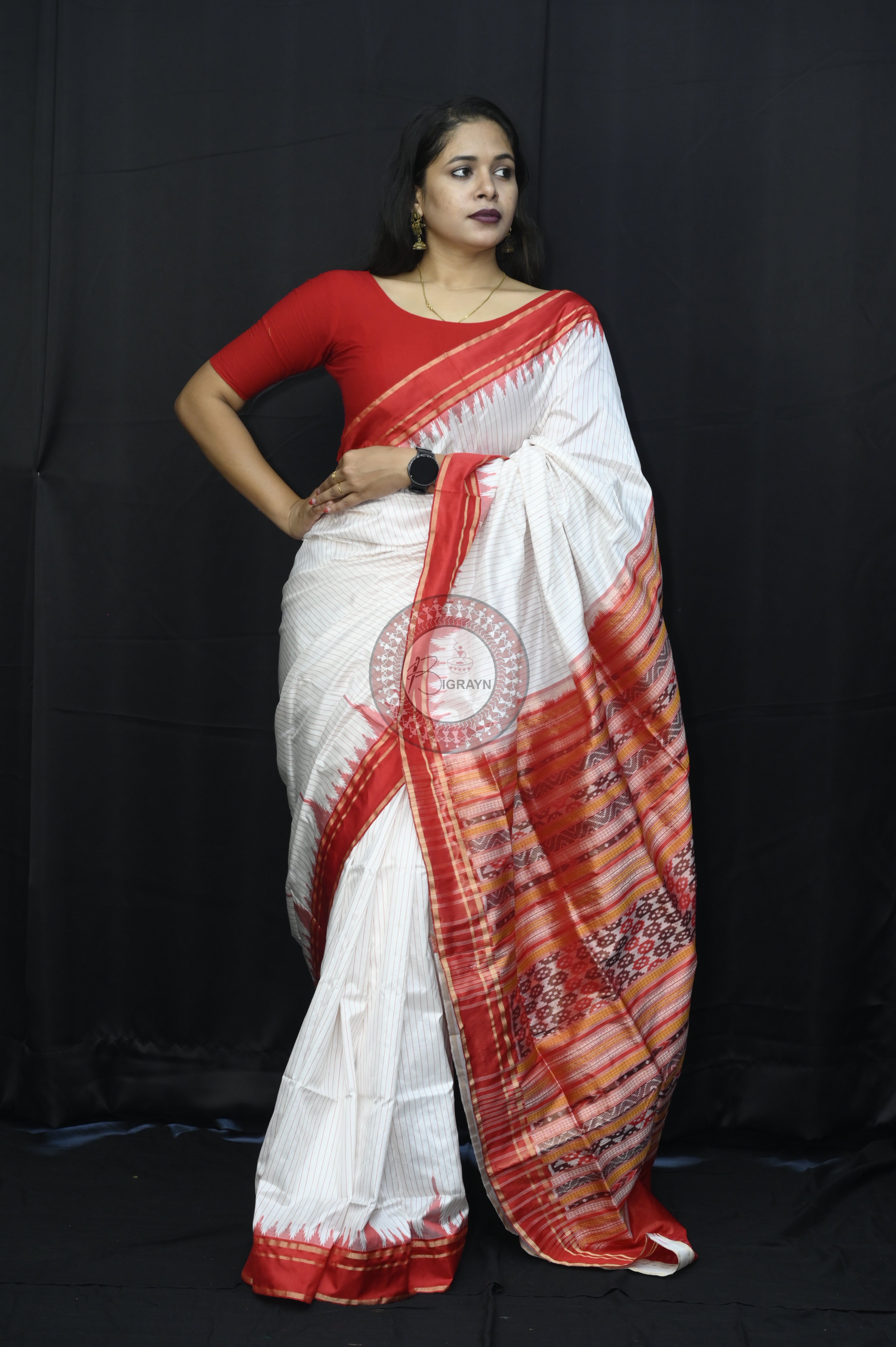 "Odisha Handloom Tissue Silk Saree with shimmering texture, elegant zari border, and lightweight drape, handcrafted by artisans"