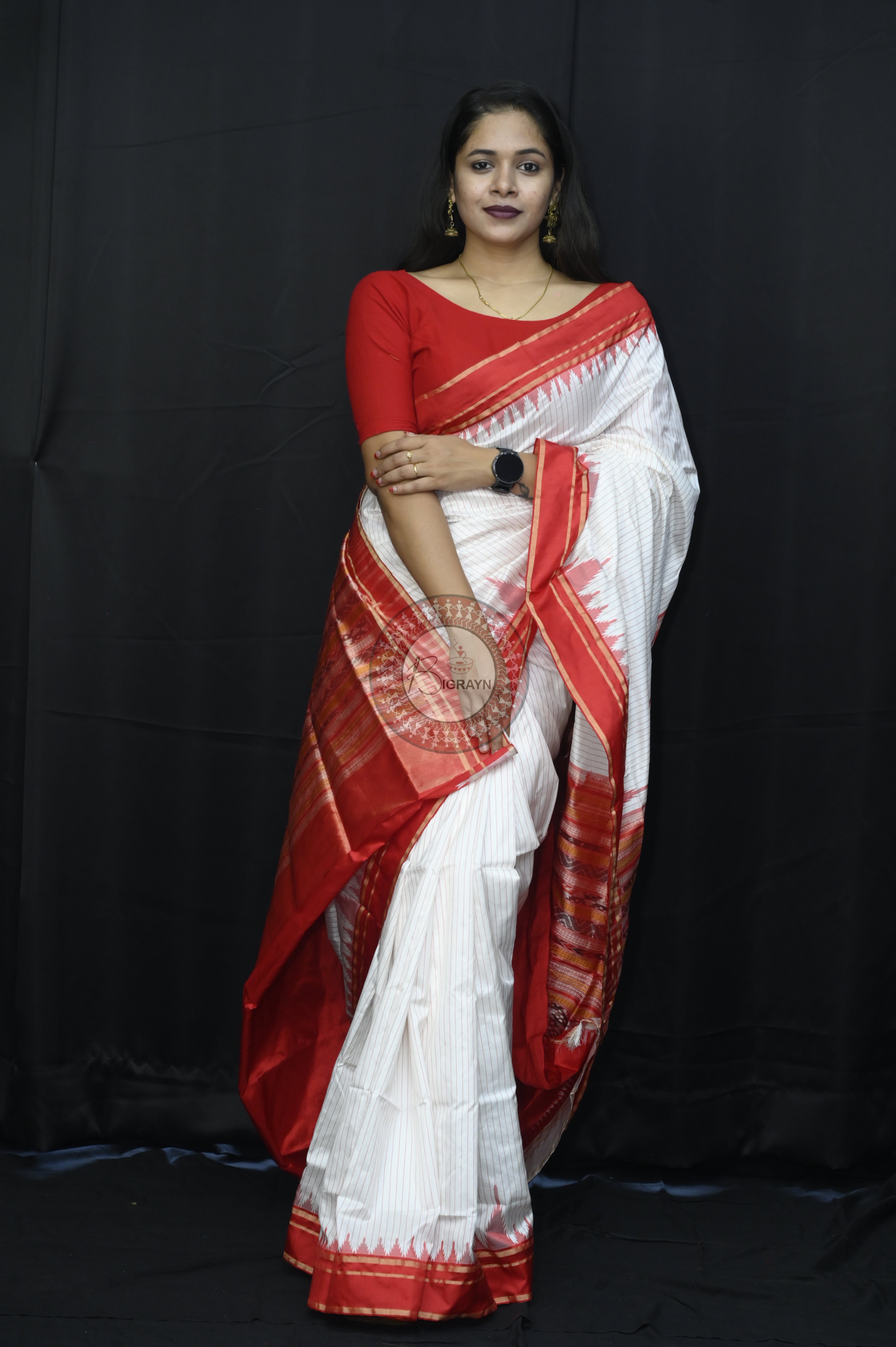 "Odisha Handloom Tissue Silk Saree with shimmering texture, elegant zari border, and lightweight drape, handcrafted by artisans"