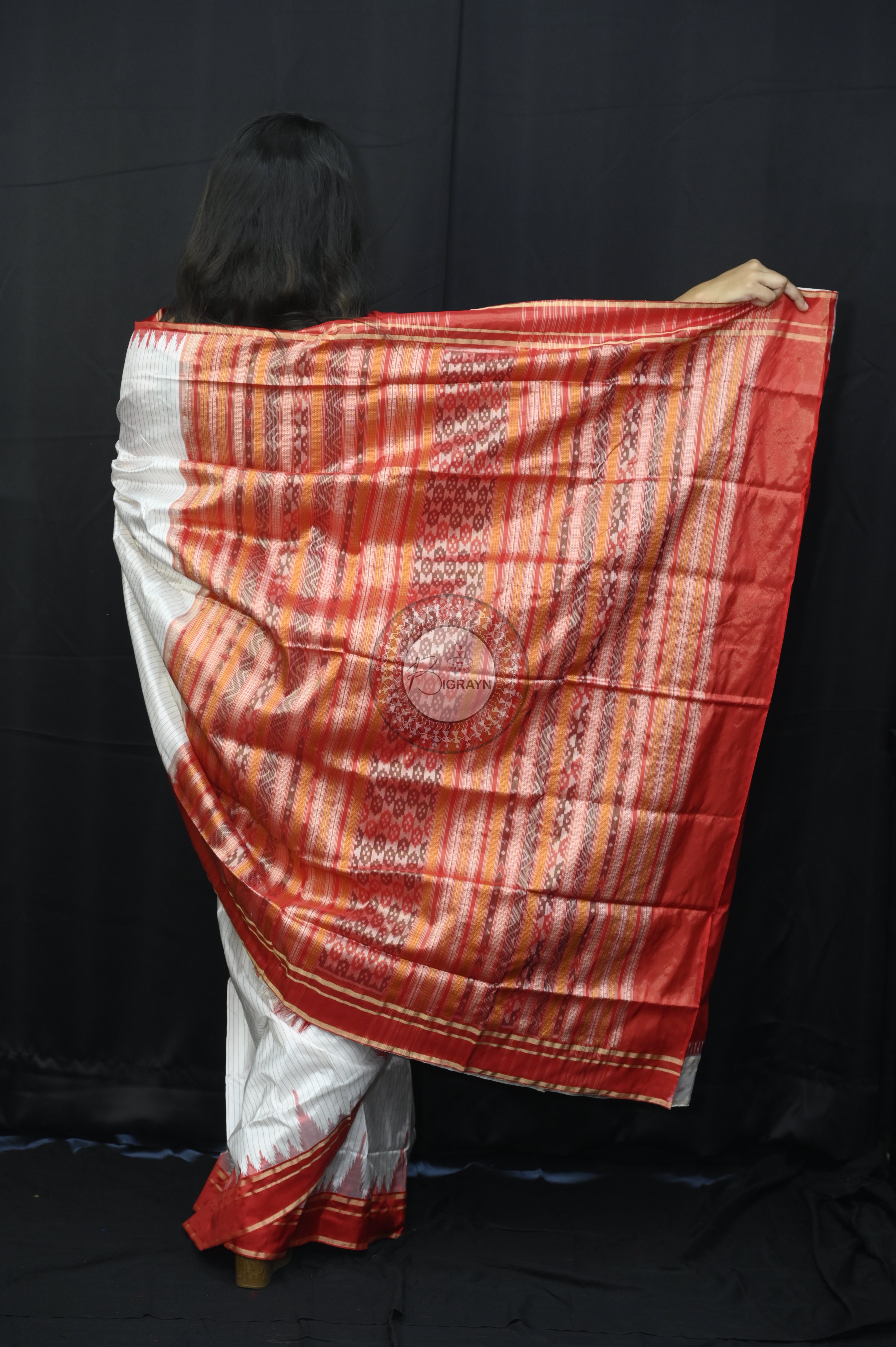 "Odisha Handloom Tissue Silk Saree with shimmering texture, elegant zari border, and lightweight drape, handcrafted by artisans"