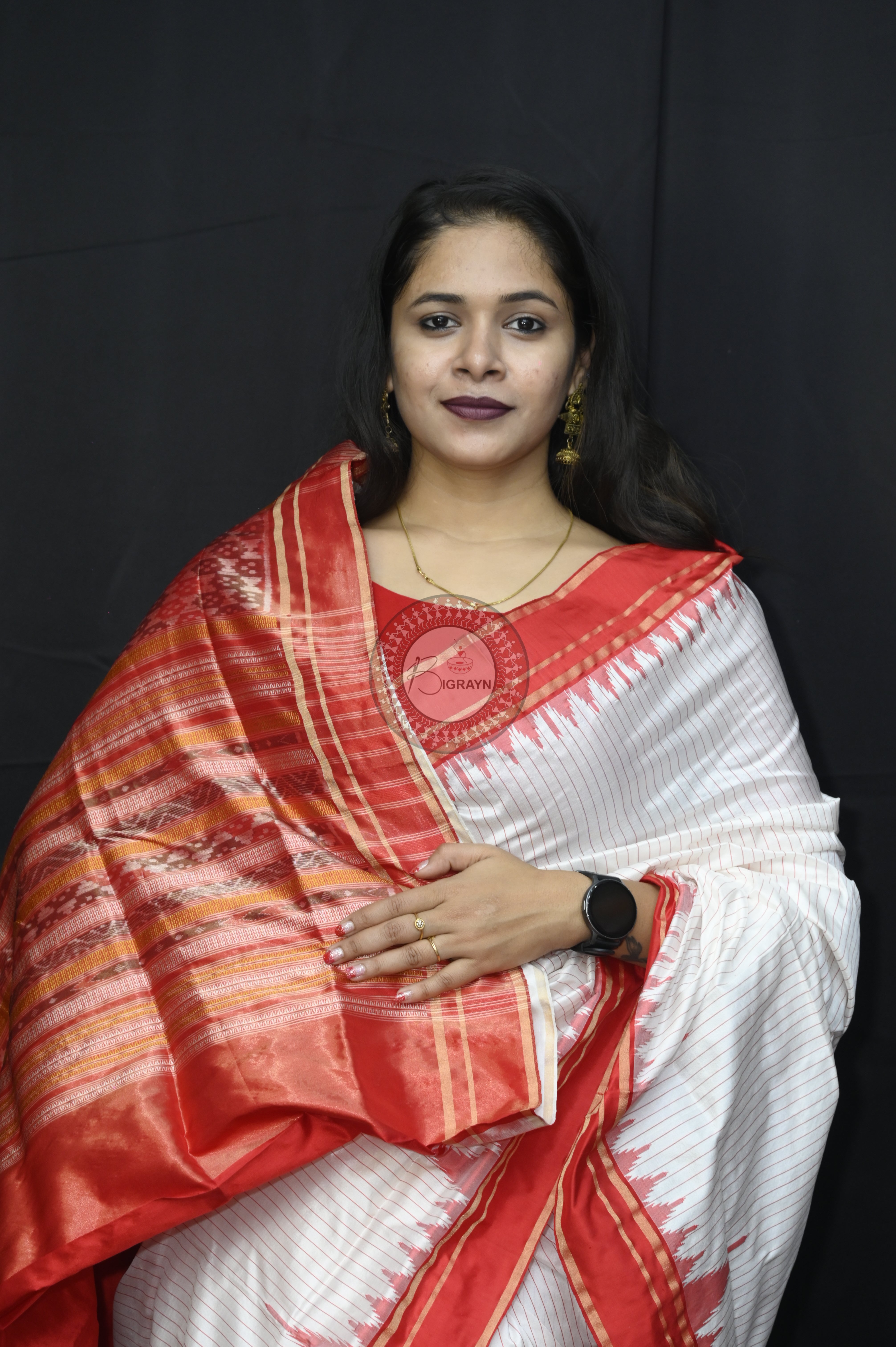 "Odisha Handloom Tissue Silk Saree with shimmering texture, elegant zari border, and lightweight drape, handcrafted by artisans"