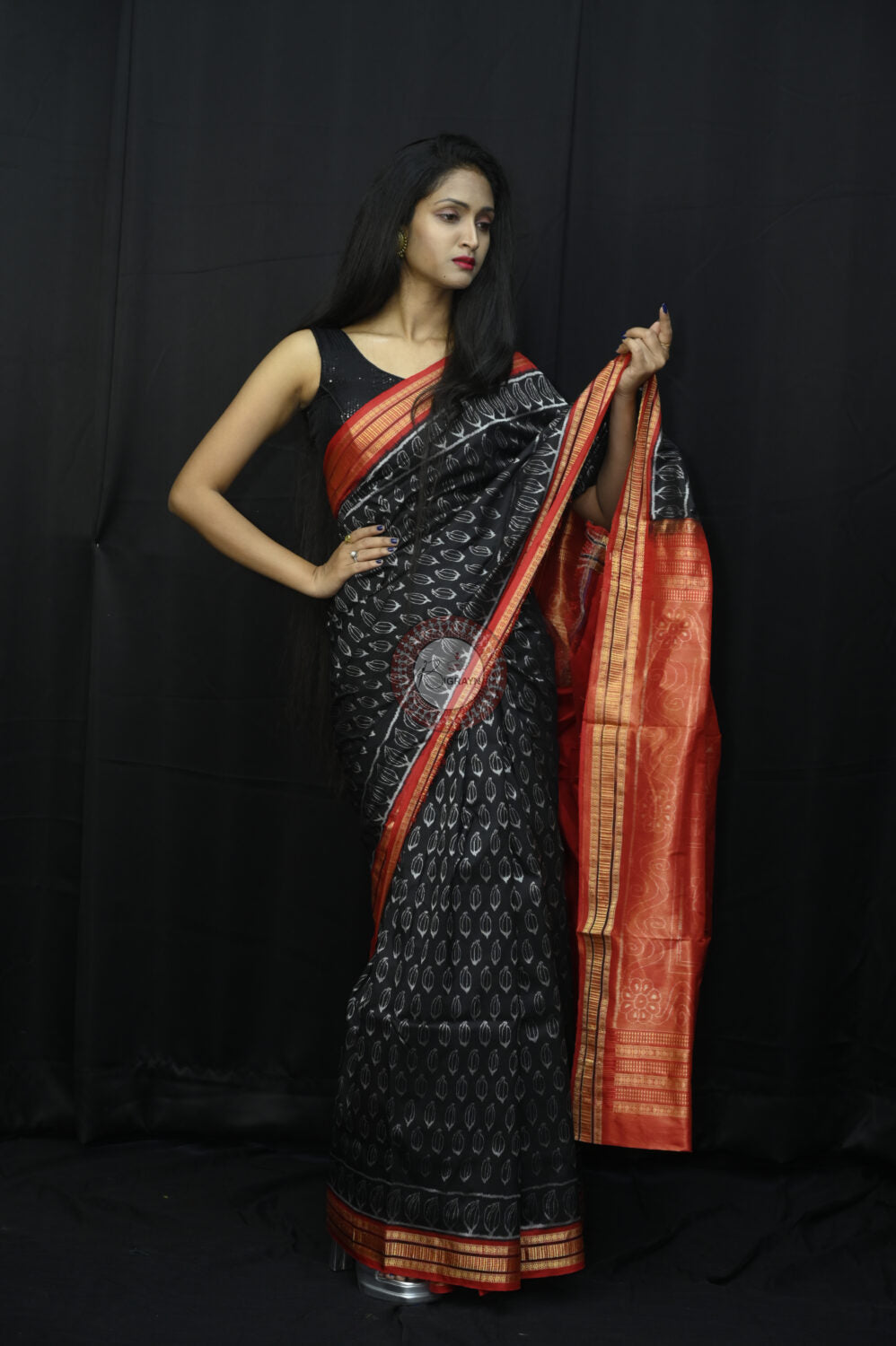 "Odisha Handloom Tissue Silk Saree with shimmering texture, elegant zari border, and lightweight drape, handcrafted by artisans"