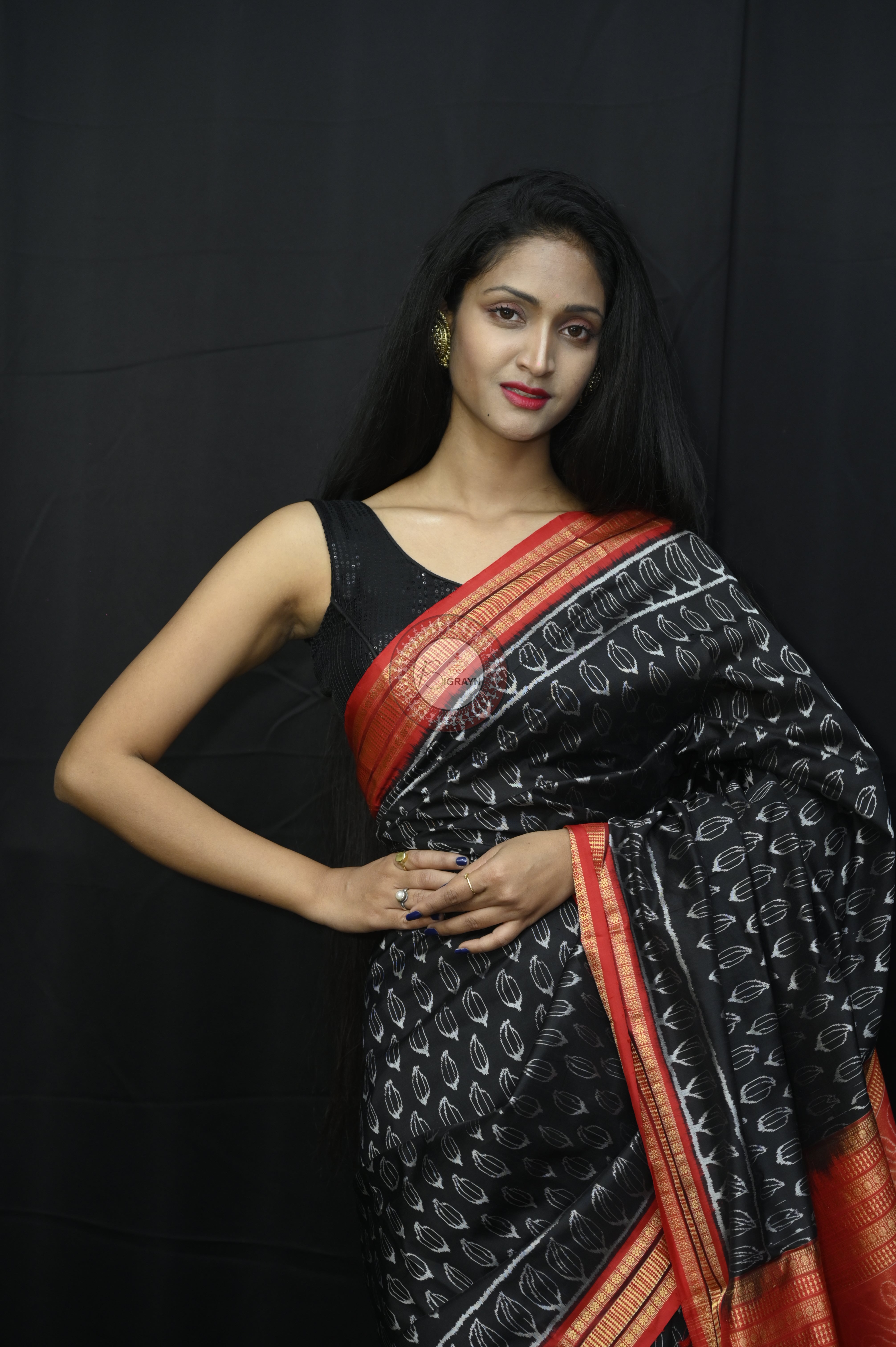 "Odisha Handloom Tissue Silk Saree with shimmering texture, elegant zari border, and lightweight drape, handcrafted by artisans"