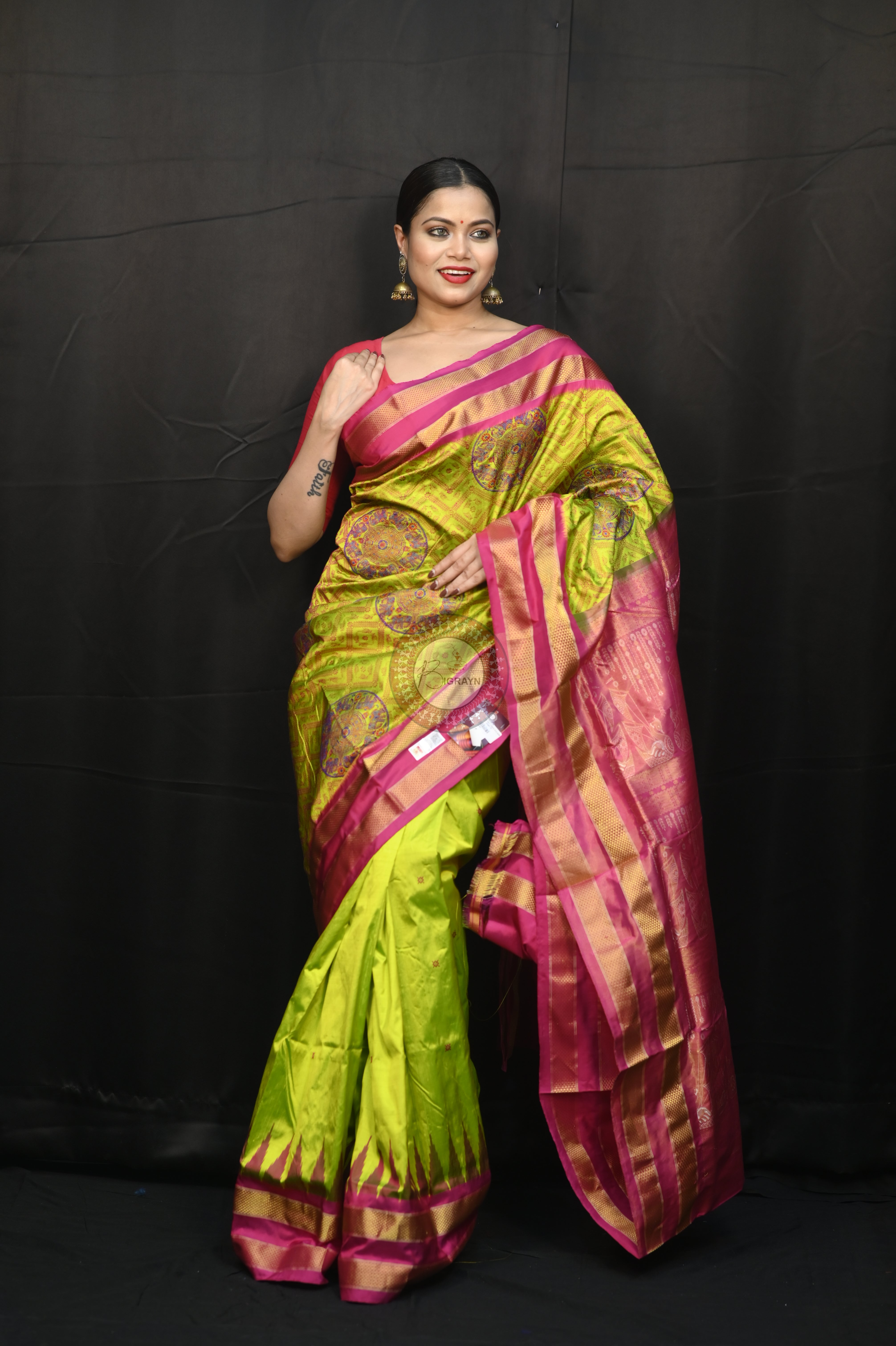 "Odisha Handloom Tissue Silk Saree with shimmering texture, elegant zari border, and lightweight drape, handcrafted by artisans"