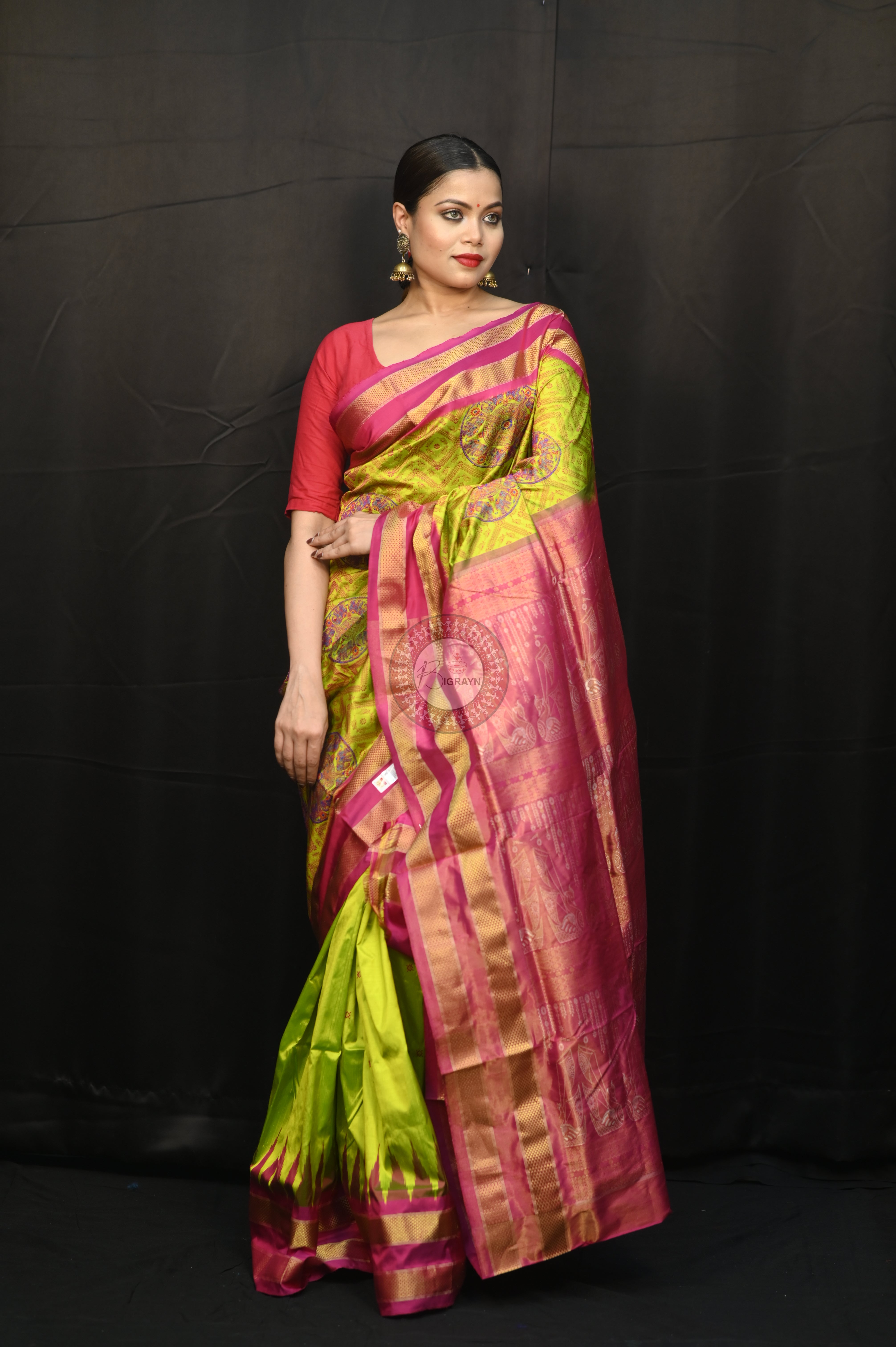 "Odisha Handloom Tissue Silk Saree with shimmering texture, elegant zari border, and lightweight drape, handcrafted by artisans"