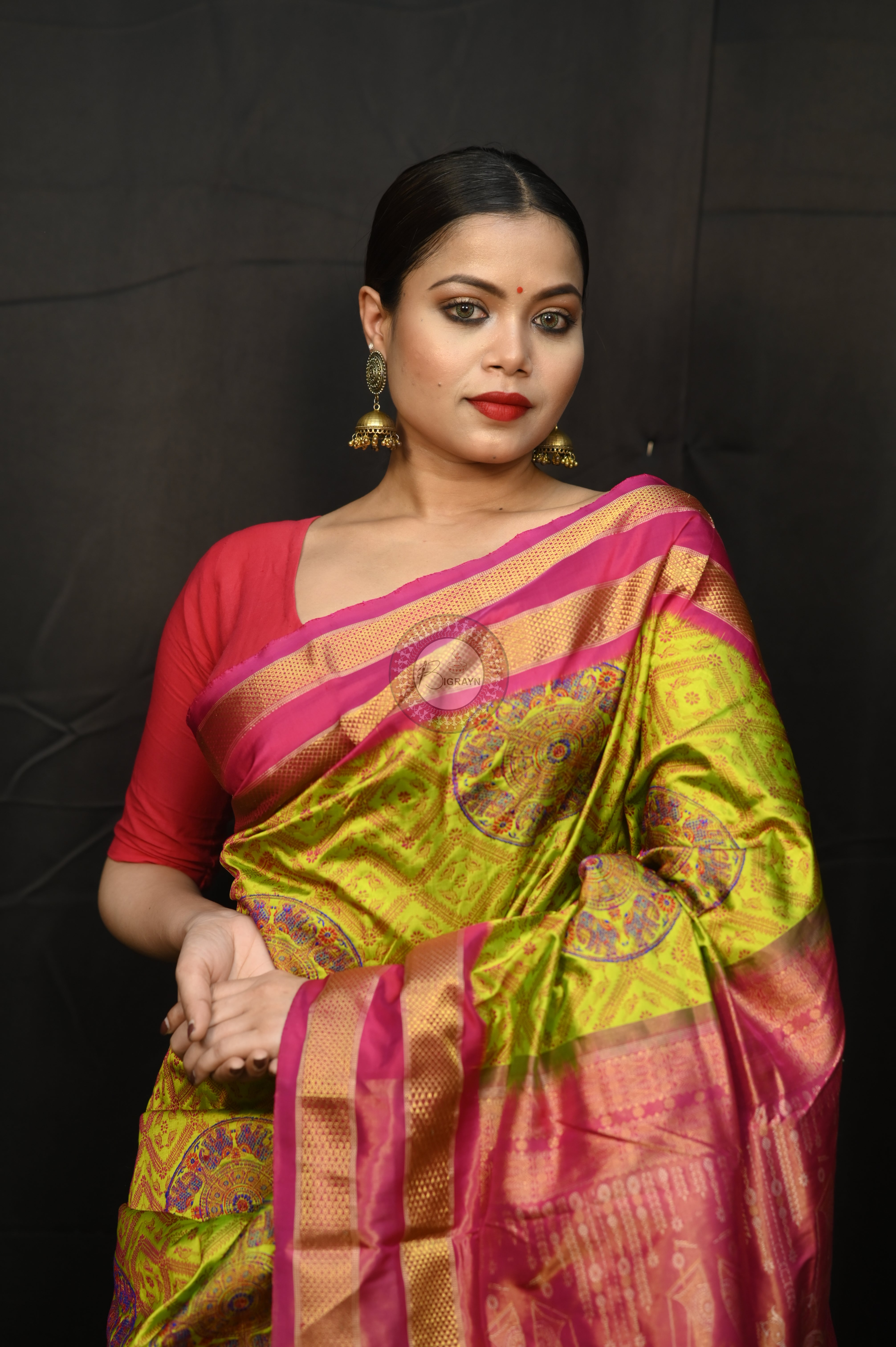 "Odisha Handloom Tissue Silk Saree with shimmering texture, elegant zari border, and lightweight drape, handcrafted by artisans"
