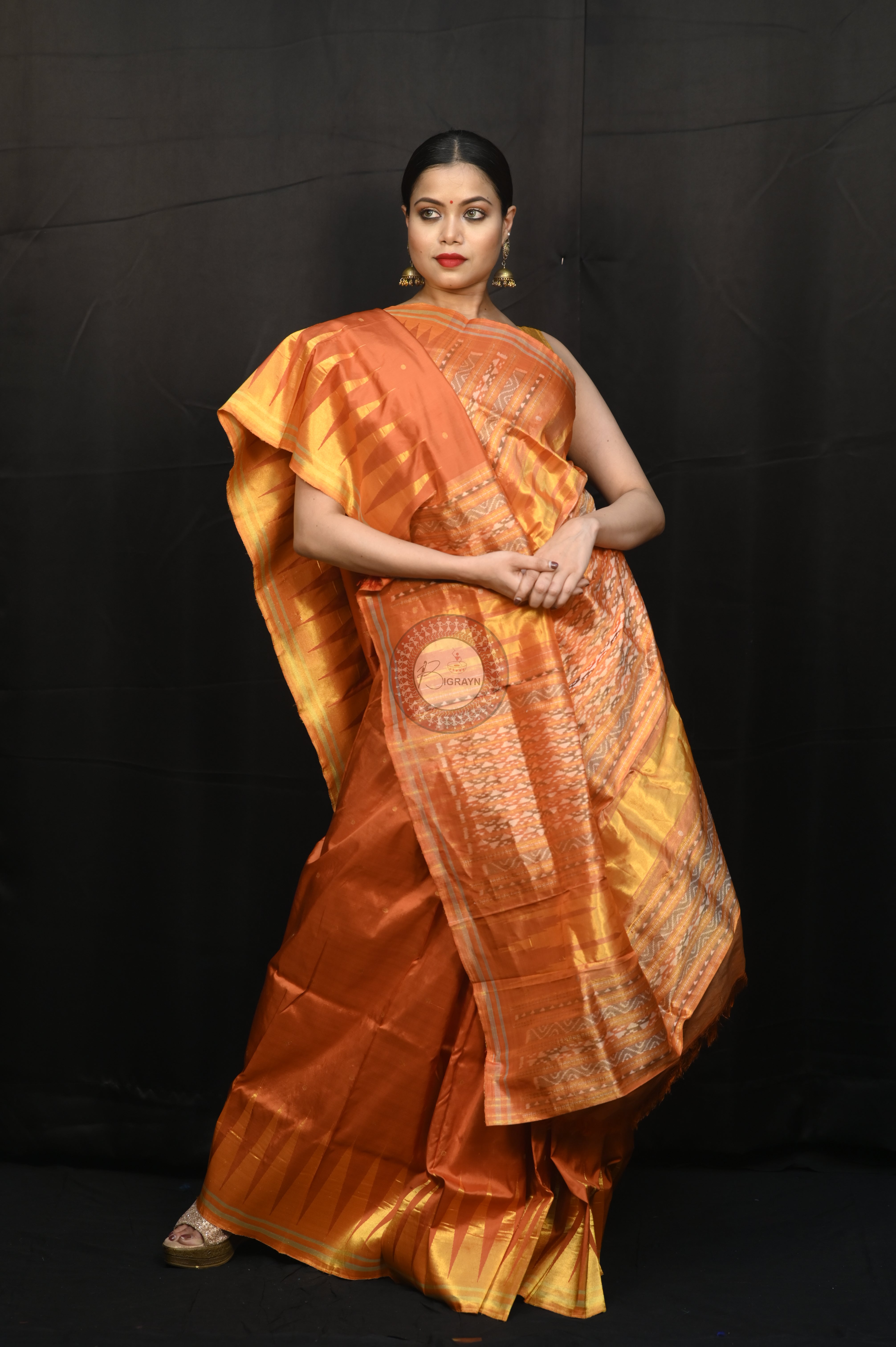 "Odisha Handloom Tissue Silk Saree with shimmering texture, elegant zari border, and lightweight drape, handcrafted by artisans"
