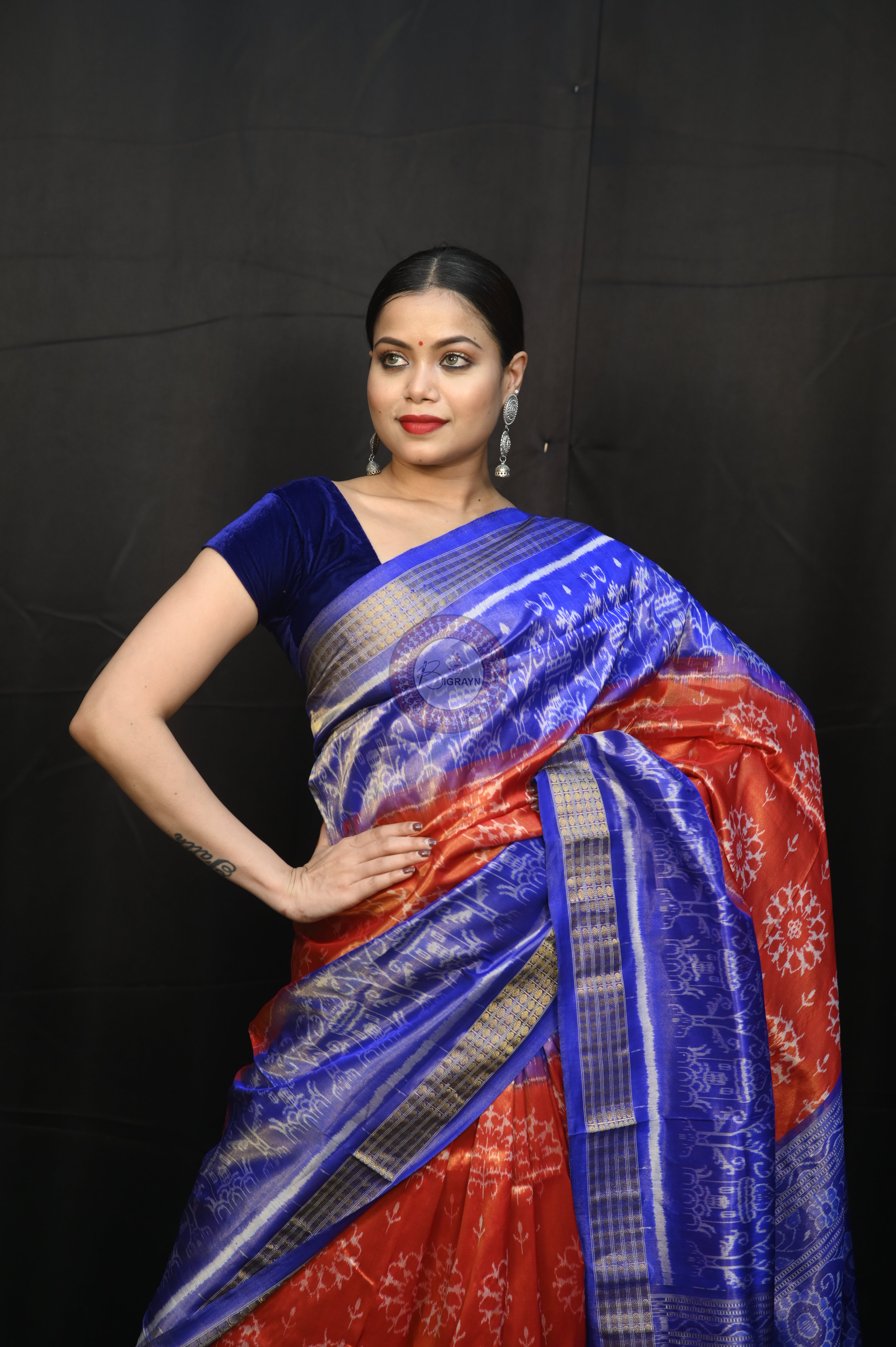 "Odisha Handloom Tissue Silk Saree with shimmering texture, elegant zari border, and lightweight drape, handcrafted by artisans"