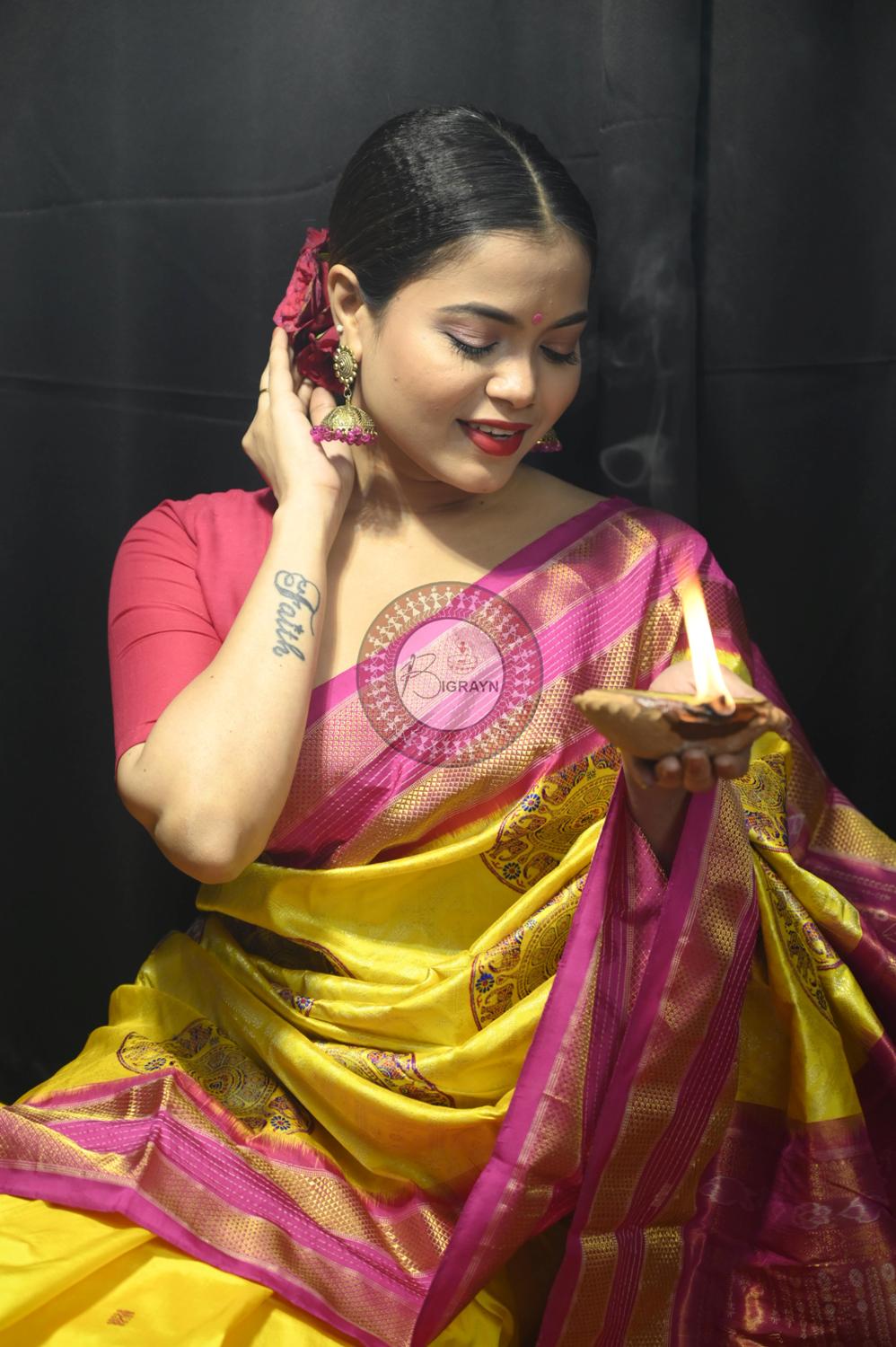"Odisha Handloom Tissue Silk Saree with shimmering texture, elegant zari border, and lightweight drape, handcrafted by artisans"
