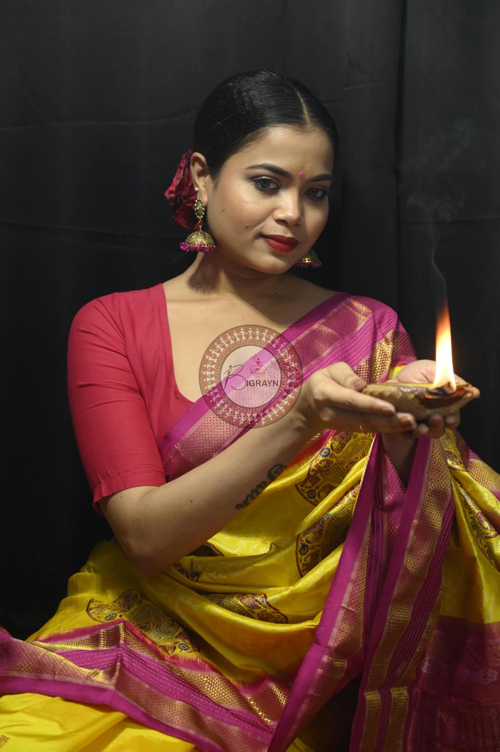 "Odisha Handloom Tissue Silk Saree with shimmering texture, elegant zari border, and lightweight drape, handcrafted by artisans"