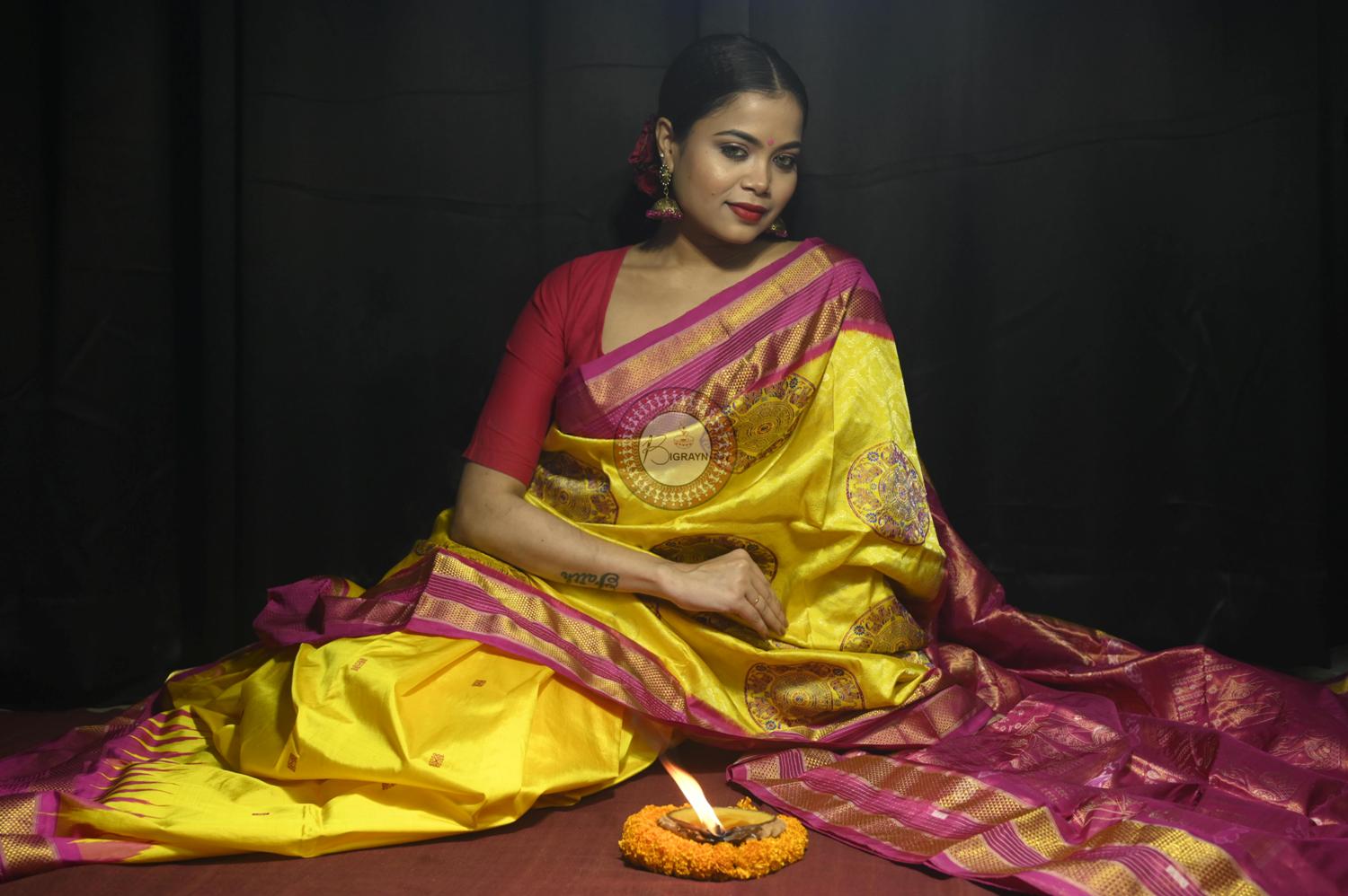 "Odisha Handloom Tissue Silk Saree with shimmering texture, elegant zari border, and lightweight drape, handcrafted by artisans"