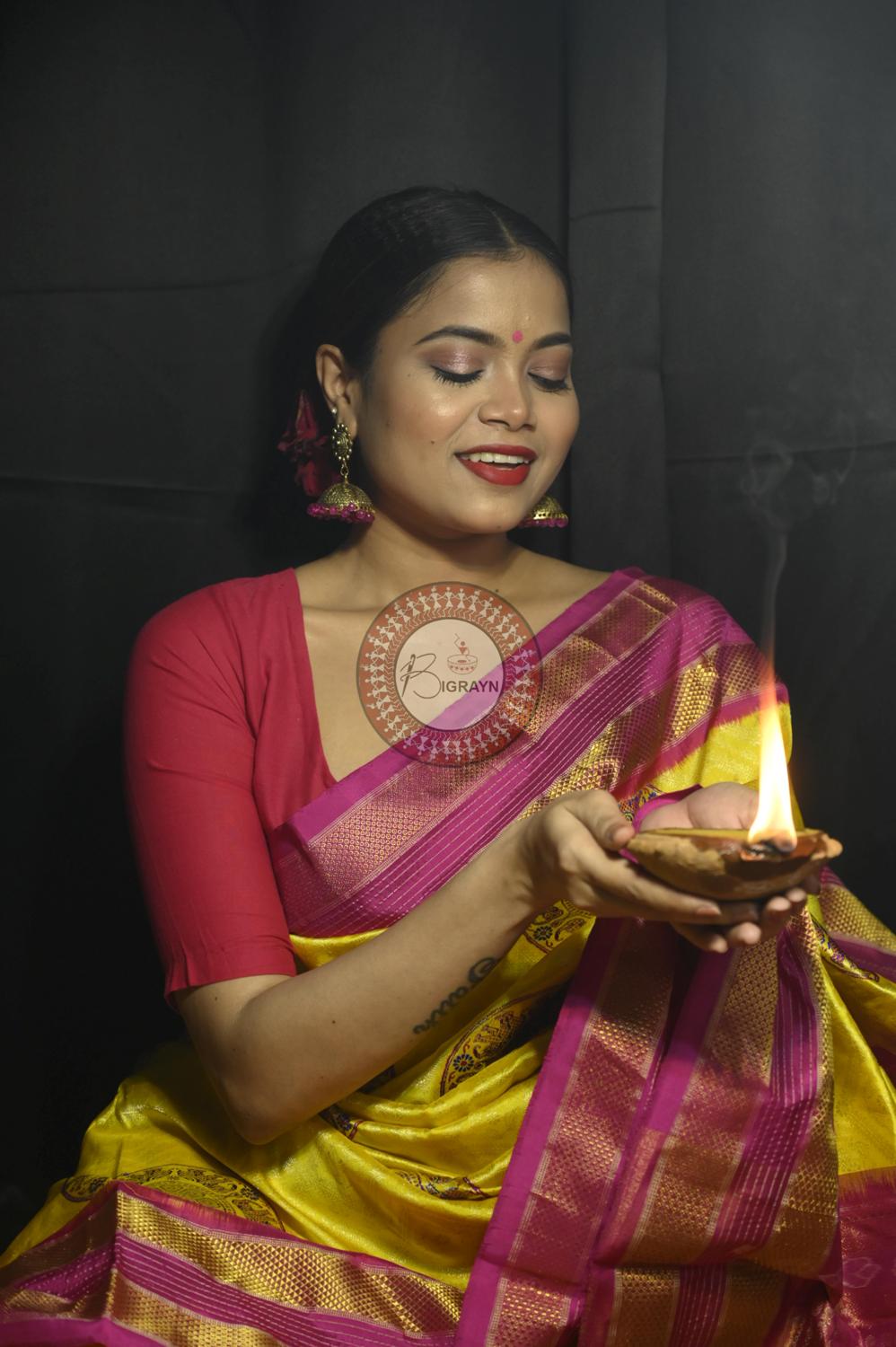 "Odisha Handloom Tissue Silk Saree with shimmering texture, elegant zari border, and lightweight drape, handcrafted by artisans"