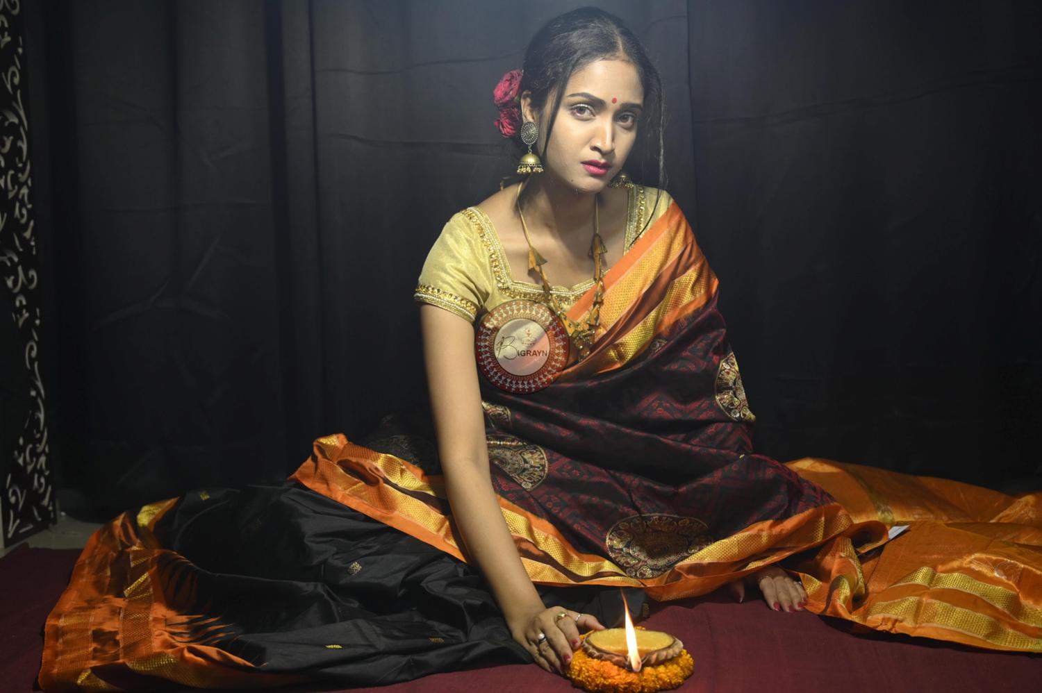 "Odisha Handloom Tissue Silk Saree with shimmering texture, elegant zari border, and lightweight drape, handcrafted by artisans"