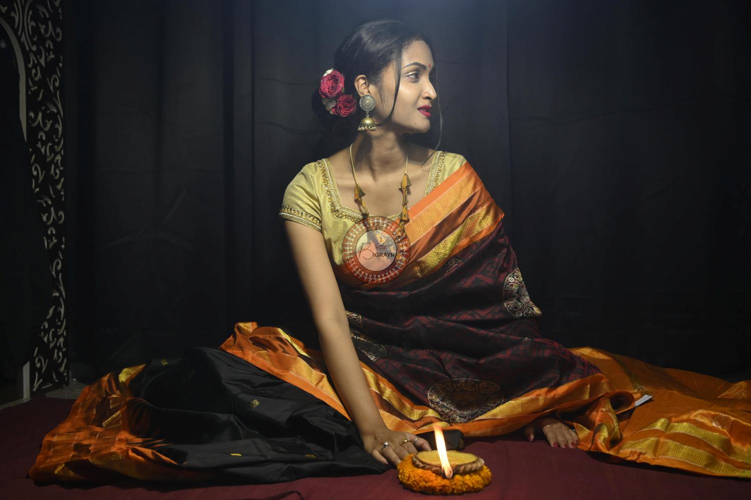 "Odisha Handloom Tissue Silk Saree with shimmering texture, elegant zari border, and lightweight drape, handcrafted by artisans"