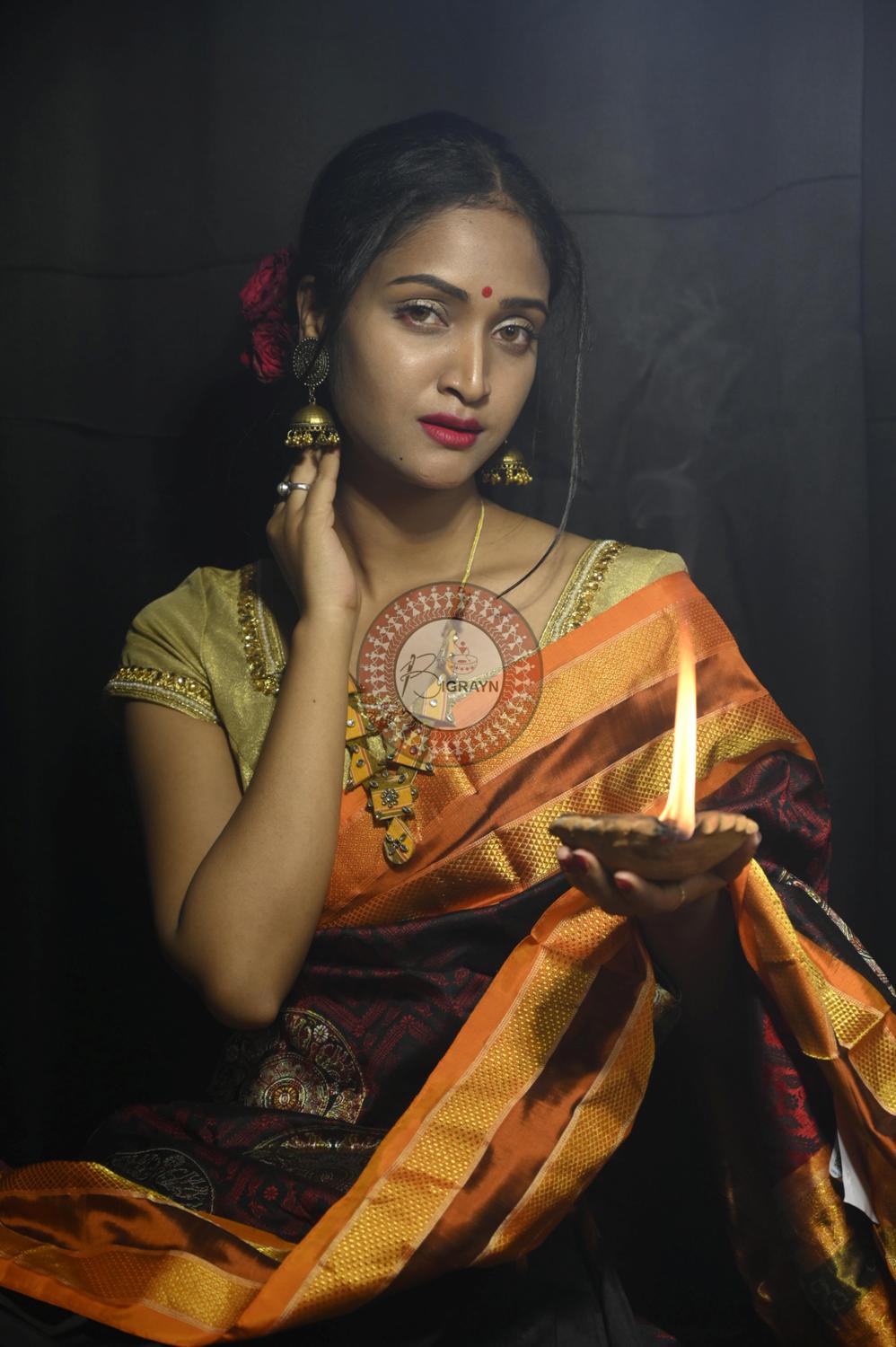"Odisha Handloom Tissue Silk Saree with shimmering texture, elegant zari border, and lightweight drape, handcrafted by artisans"