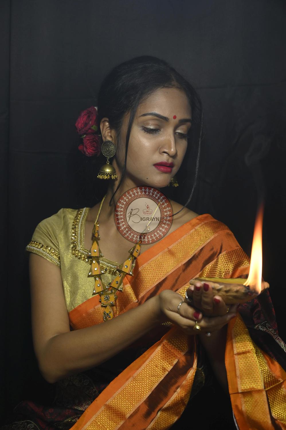 "Odisha Handloom Tissue Silk Saree with shimmering texture, elegant zari border, and lightweight drape, handcrafted by artisans"