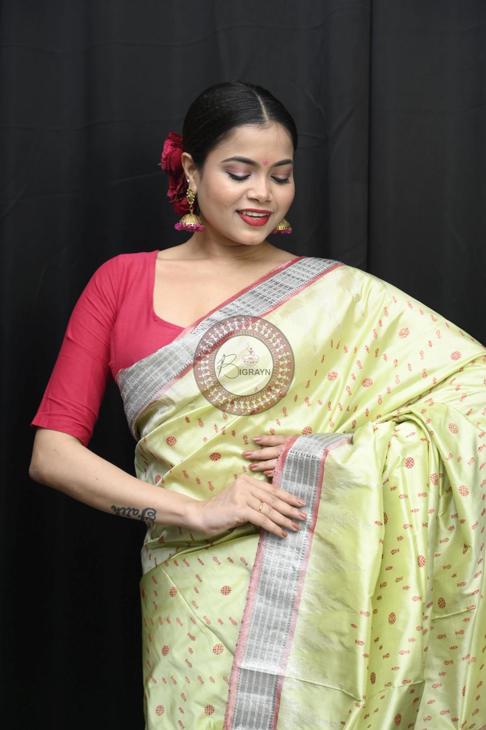 "Odisha Handloom Tissue Silk Saree with shimmering texture, elegant zari border, and lightweight drape, handcrafted by artisans"