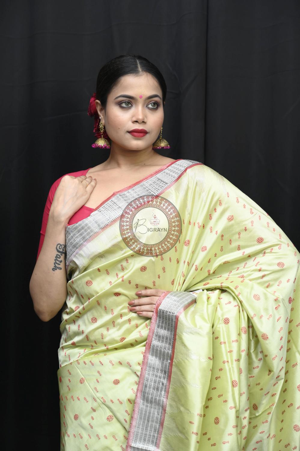 "Odisha Handloom Tissue Silk Saree with shimmering texture, elegant zari border, and lightweight drape, handcrafted by artisans"
