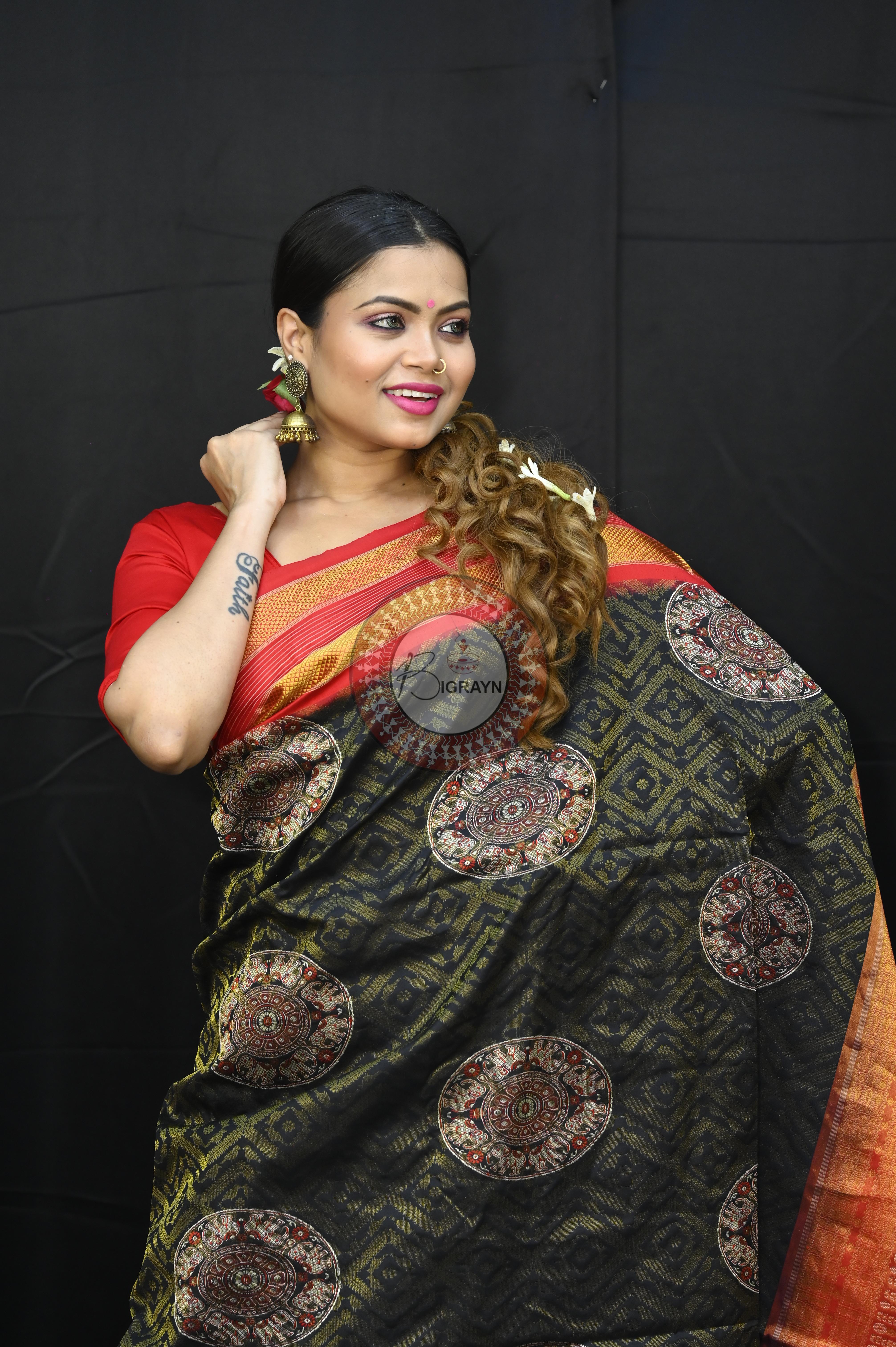 "Odisha Handloom Tissue Silk Saree with shimmering texture, elegant zari border, and lightweight drape, handcrafted by artisans"