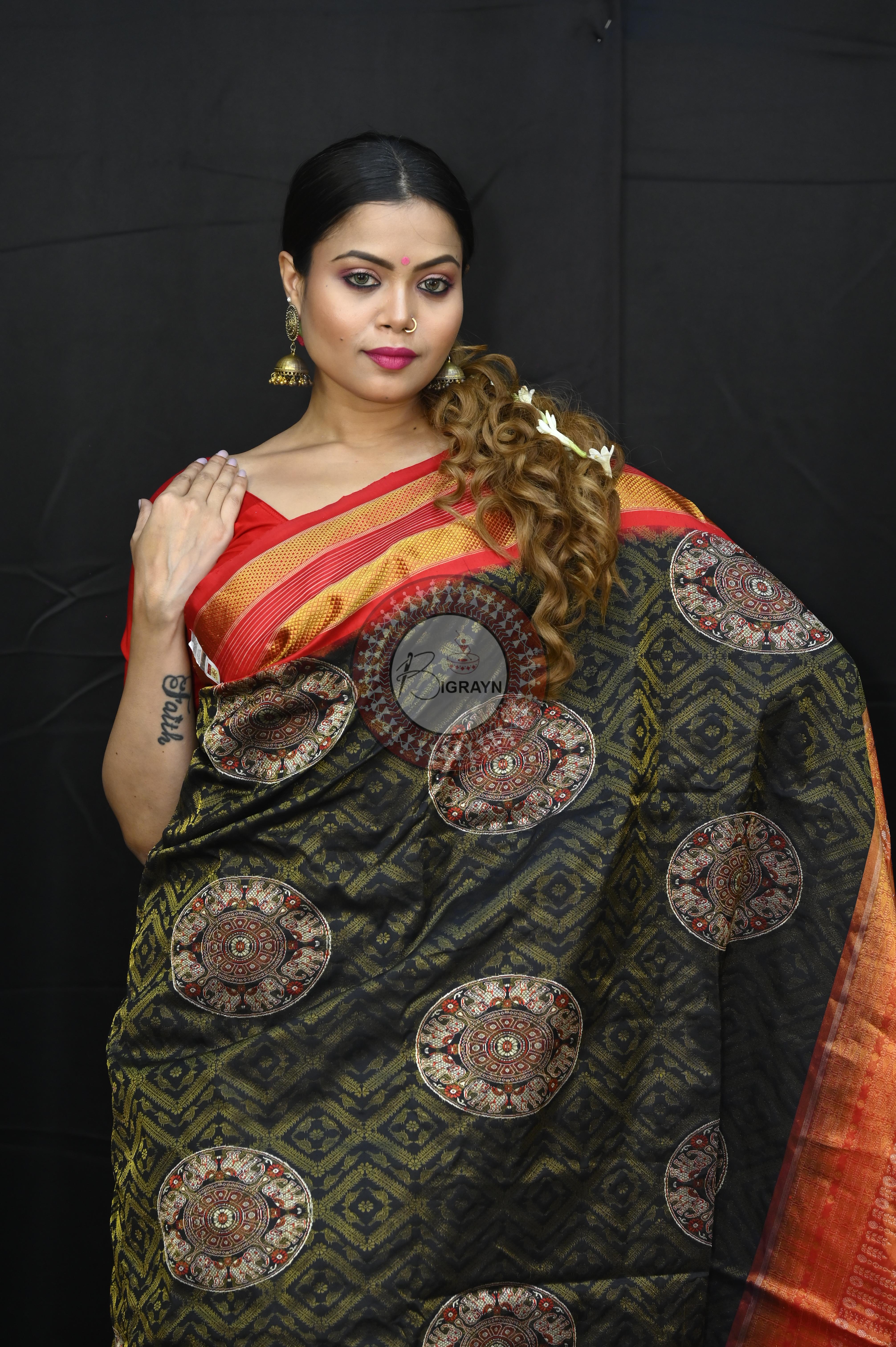 "Odisha Handloom Tissue Silk Saree with shimmering texture, elegant zari border, and lightweight drape, handcrafted by artisans"