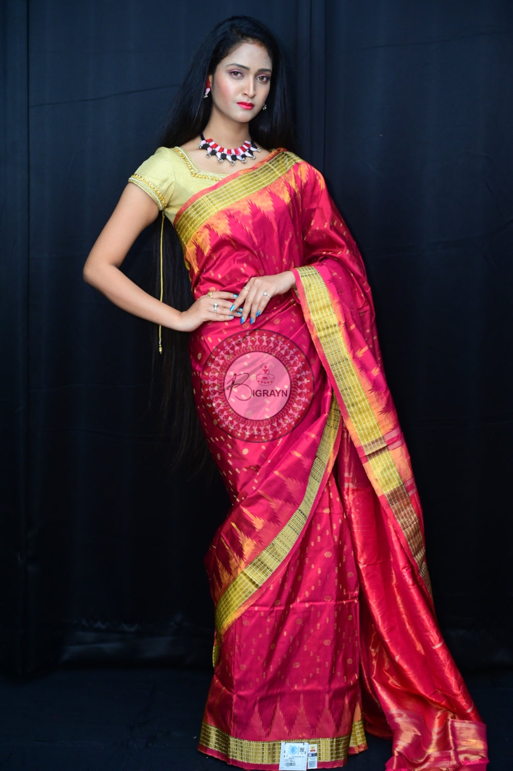 "Odisha Handloom Tissue Silk Saree with shimmering texture, elegant zari border, and lightweight drape, handcrafted by artisans"