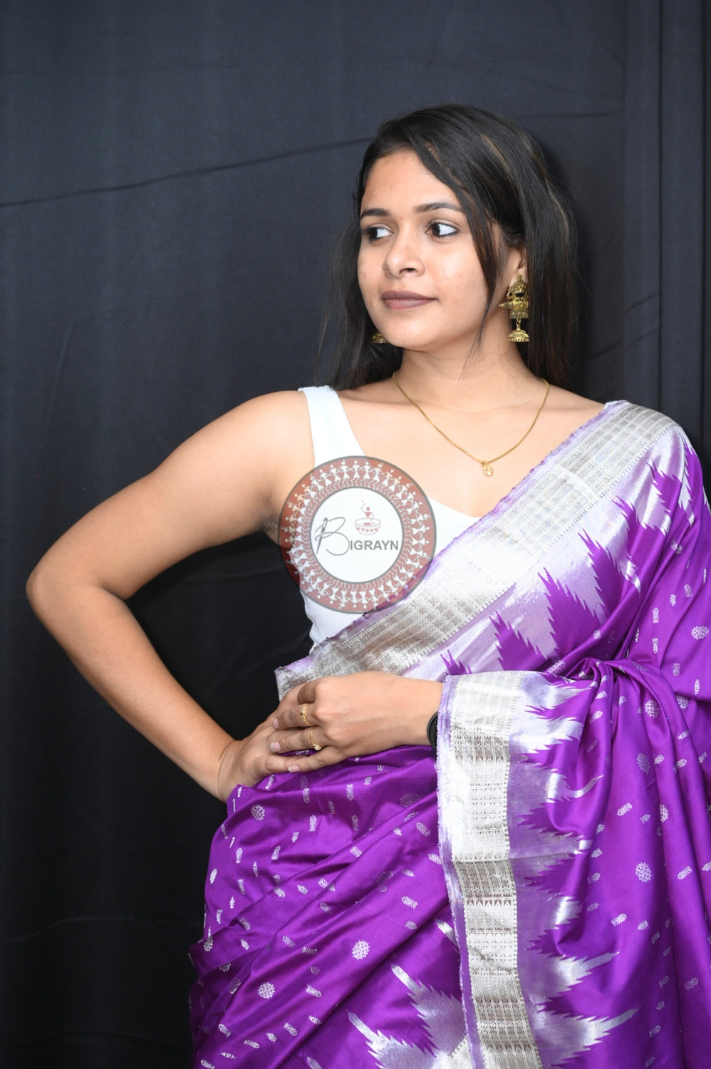 "Odisha Handloom Tissue Silk Saree with shimmering texture, elegant zari border, and lightweight drape, handcrafted by artisans"