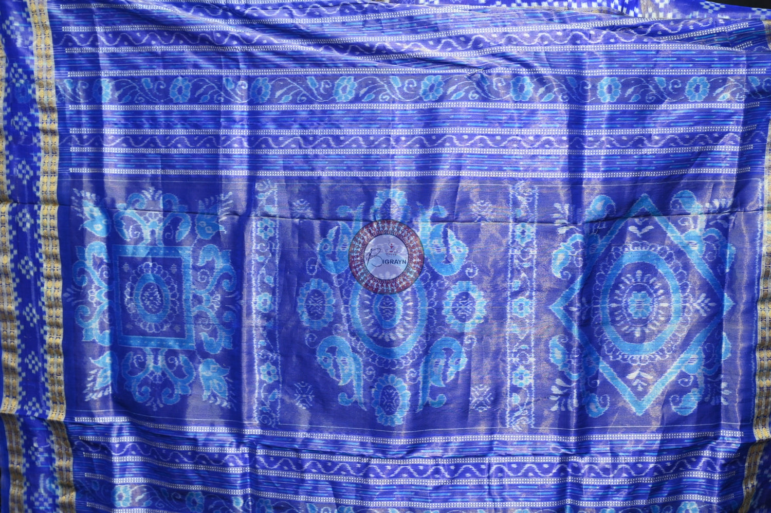 "Odisha Handloom Tissue Silk Saree with shimmering texture, elegant zari border, and lightweight drape, handcrafted by artisans"