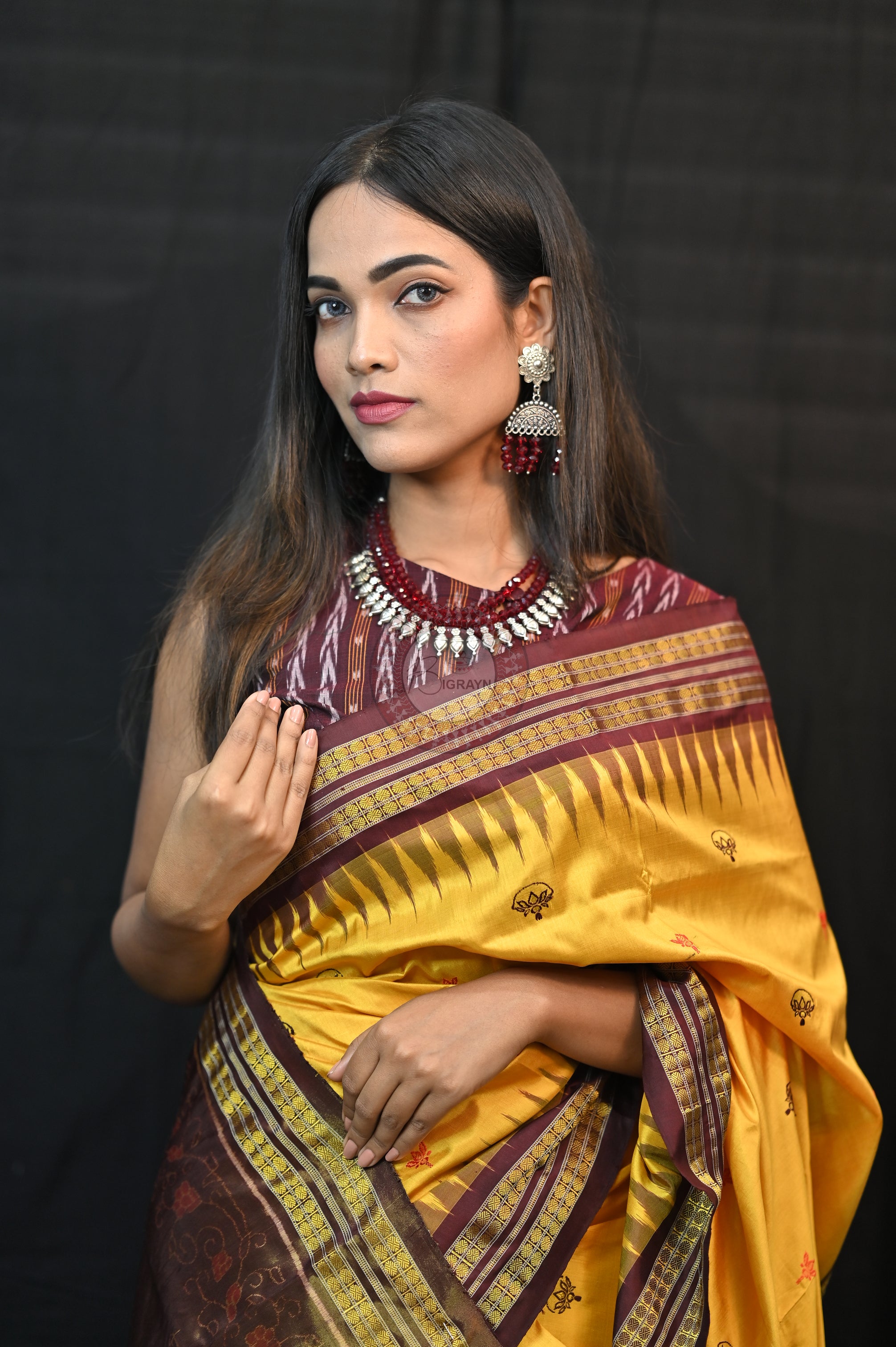 "Odisha Handloom Tissue Silk Saree with shimmering texture, elegant zari border, and lightweight drape, handcrafted by artisans"