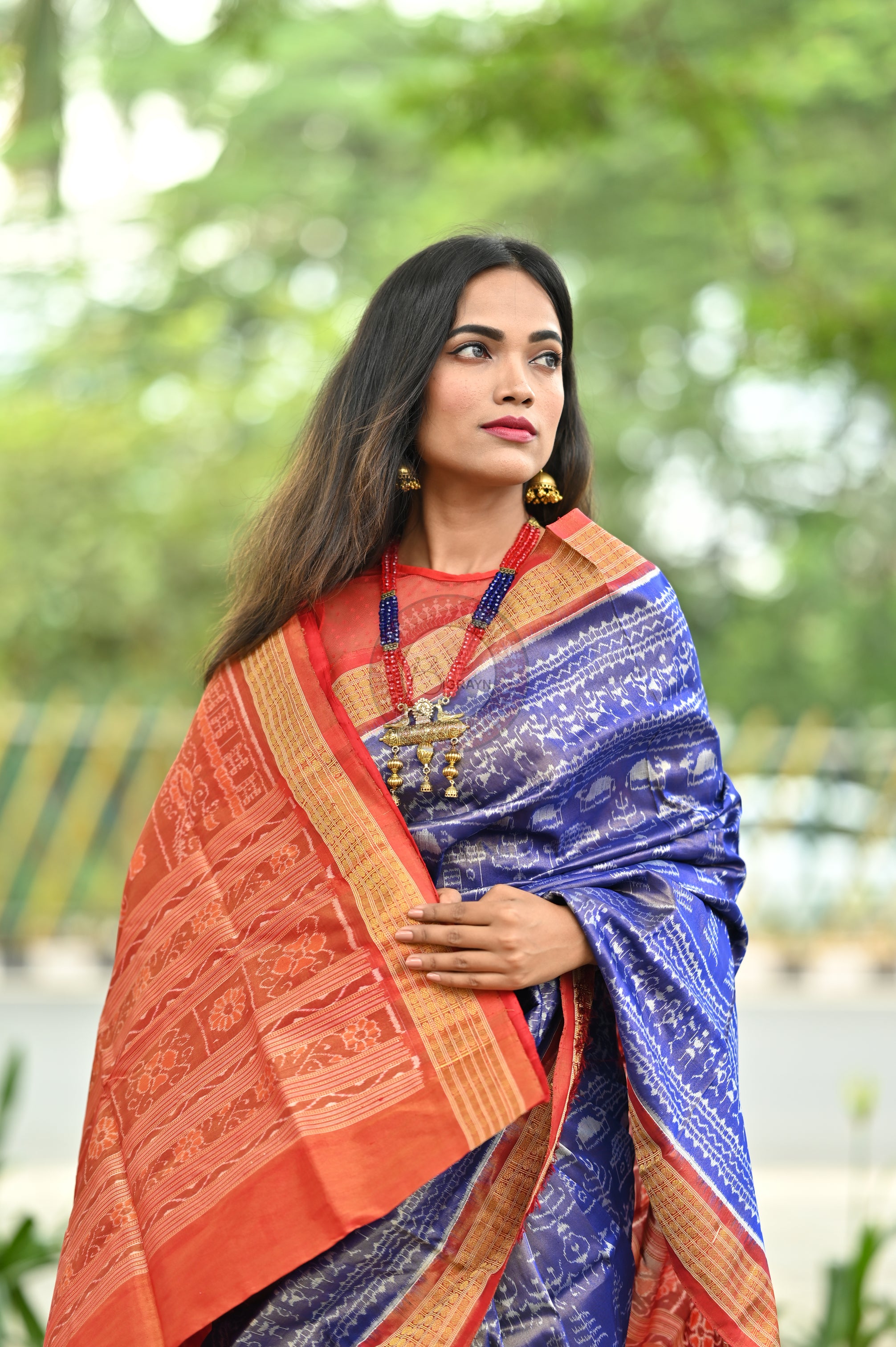 "Odisha Handloom Tissue Silk Saree with shimmering texture, elegant zari border, and lightweight drape, handcrafted by artisans"