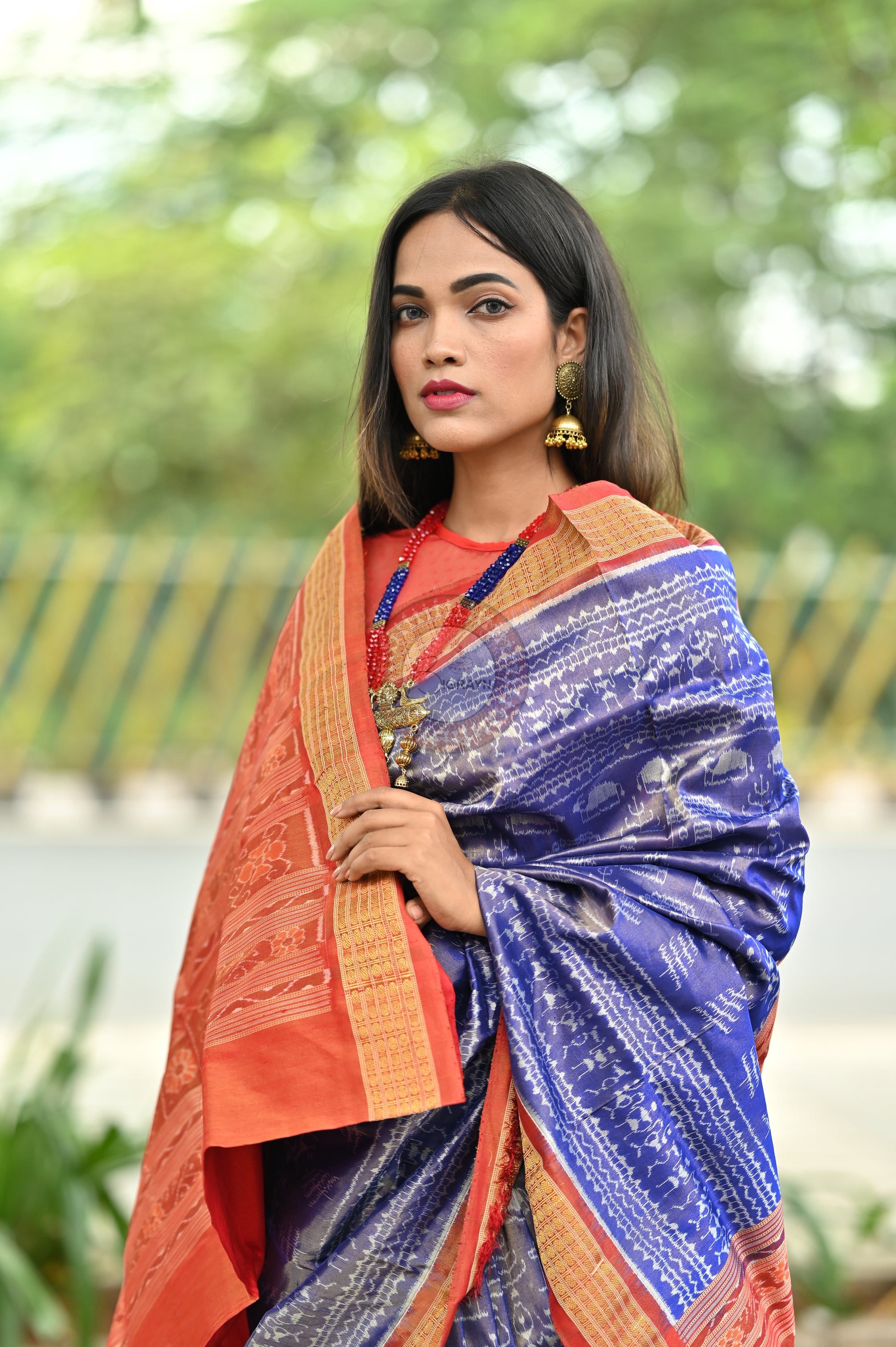 "Odisha Handloom Tissue Silk Saree with shimmering texture, elegant zari border, and lightweight drape, handcrafted by artisans"