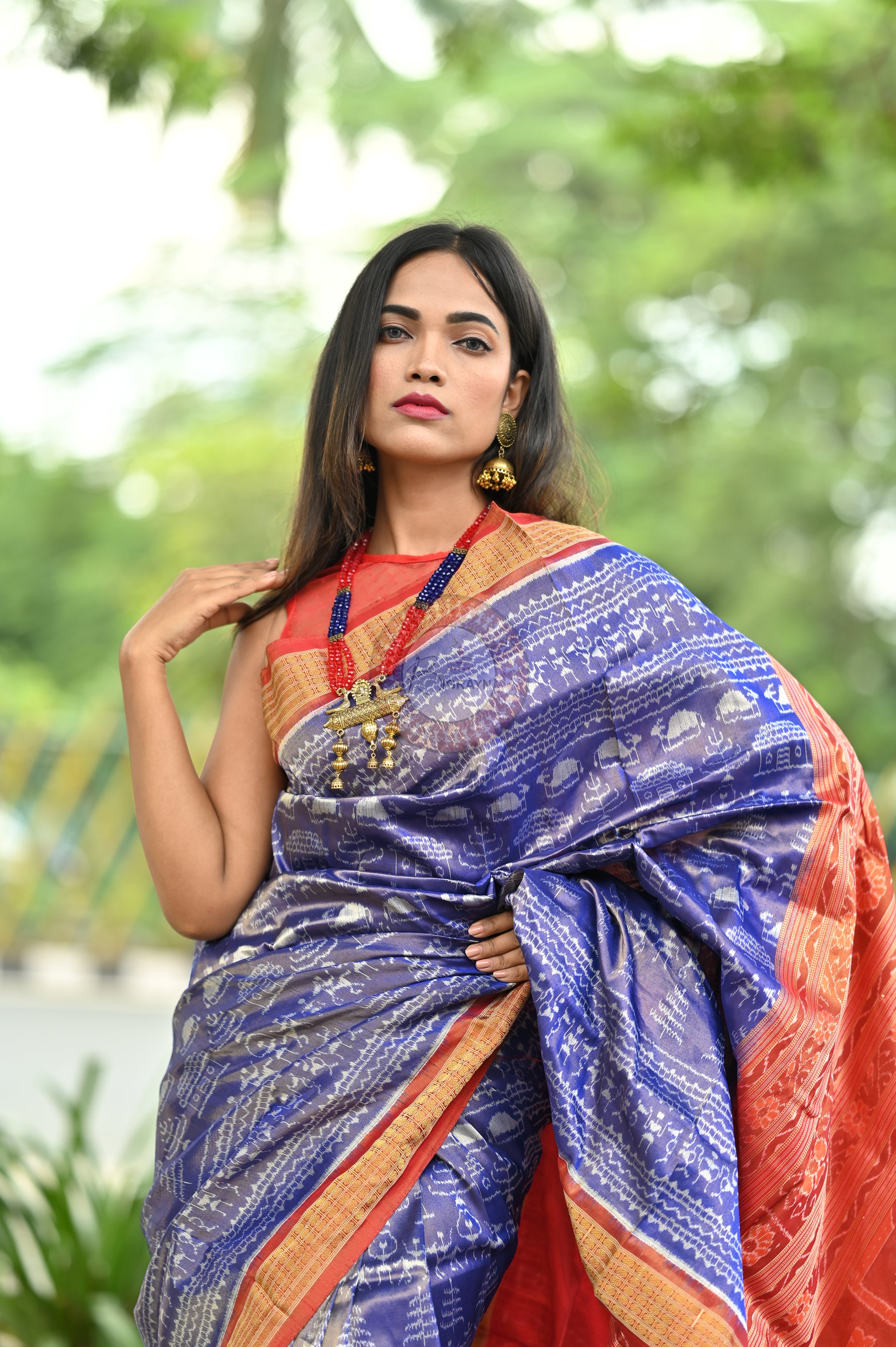"Odisha Handloom Tissue Silk Saree with shimmering texture, elegant zari border, and lightweight drape, handcrafted by artisans"