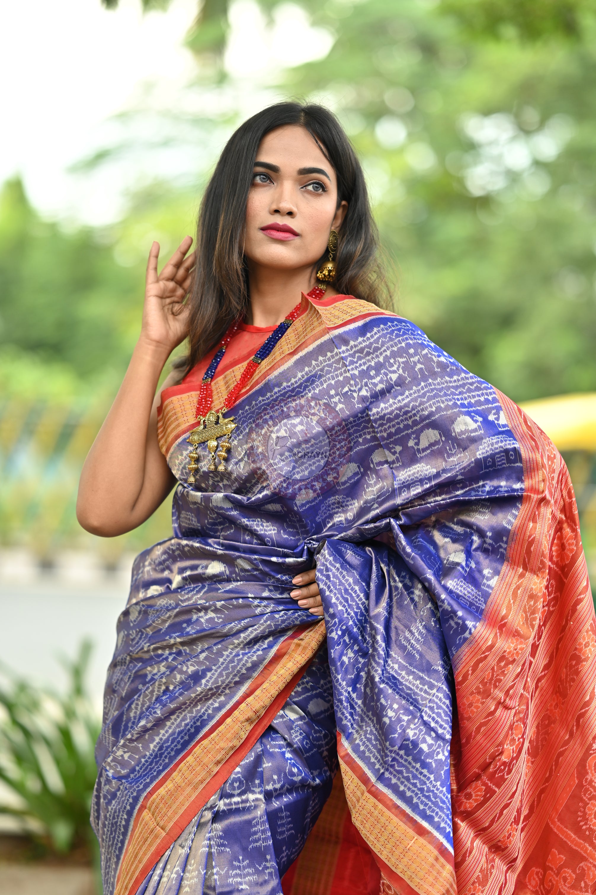 "Odisha Handloom Tissue Silk Saree with shimmering texture, elegant zari border, and lightweight drape, handcrafted by artisans"