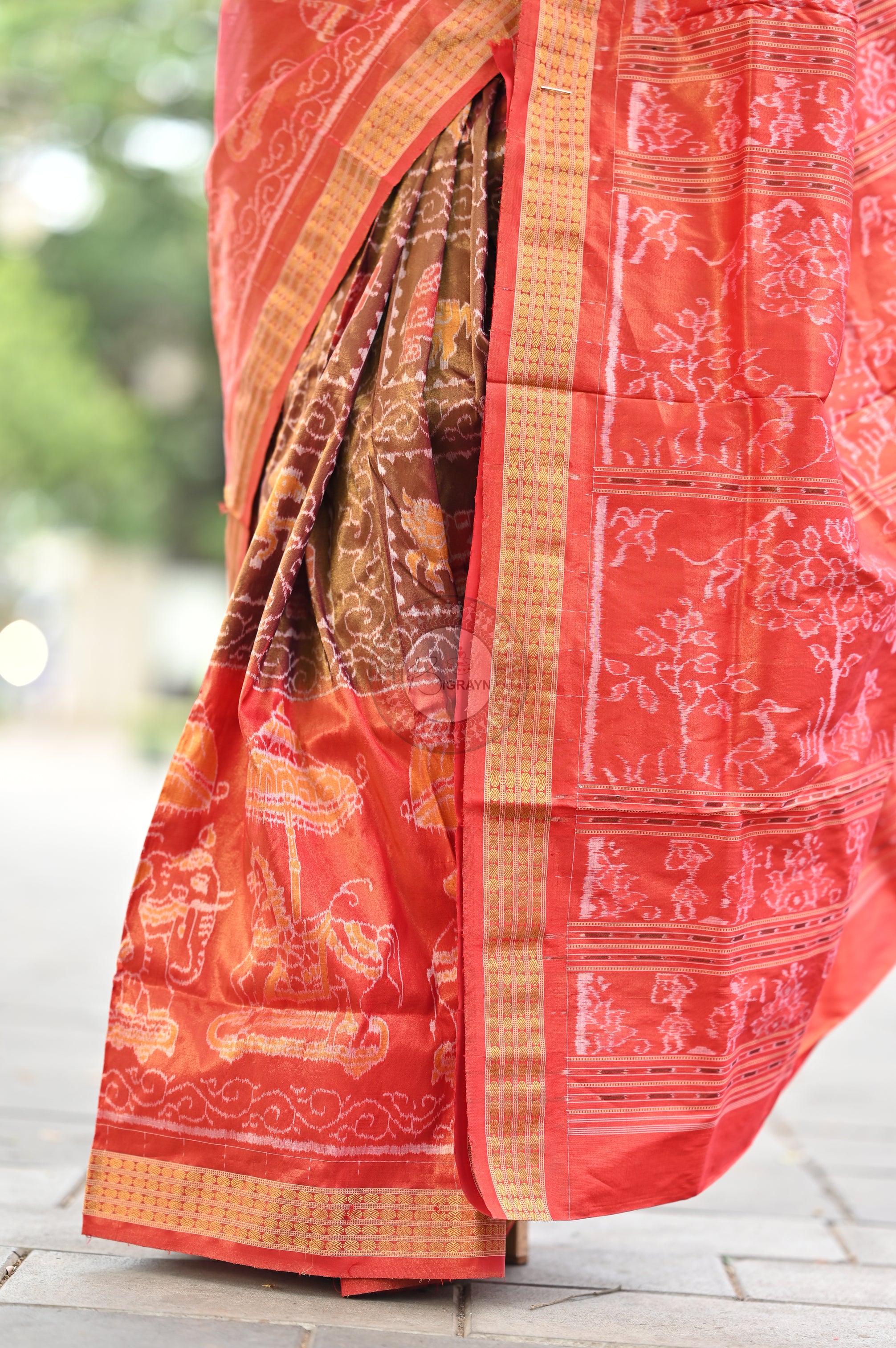 "Odisha Handloom Tissue Silk Saree with shimmering texture, elegant zari border, and lightweight drape, handcrafted by artisans"
