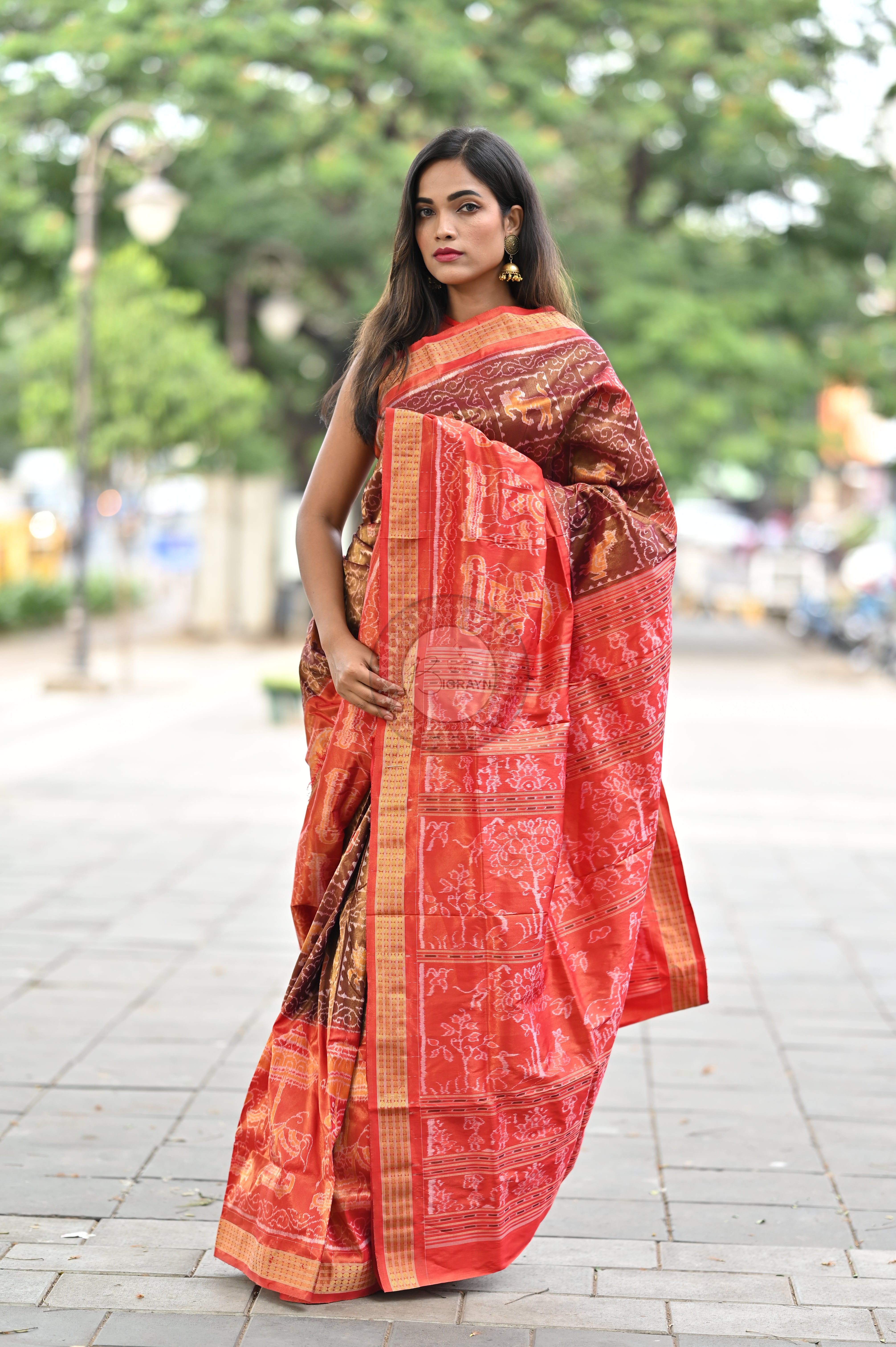 "Odisha Handloom Tissue Silk Saree with shimmering texture, elegant zari border, and lightweight drape, handcrafted by artisans"