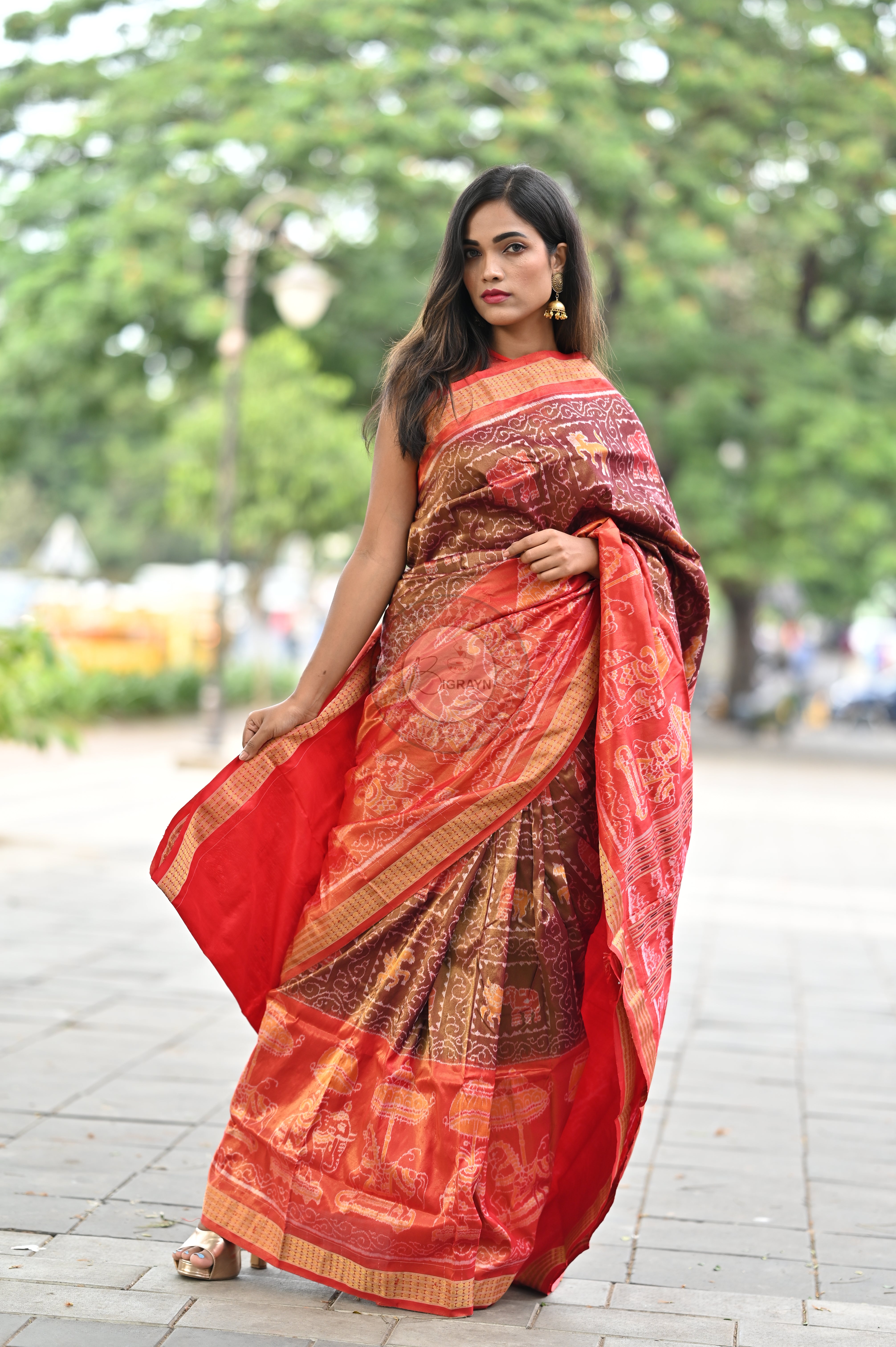 "Odisha Handloom Tissue Silk Saree with shimmering texture, elegant zari border, and lightweight drape, handcrafted by artisans"