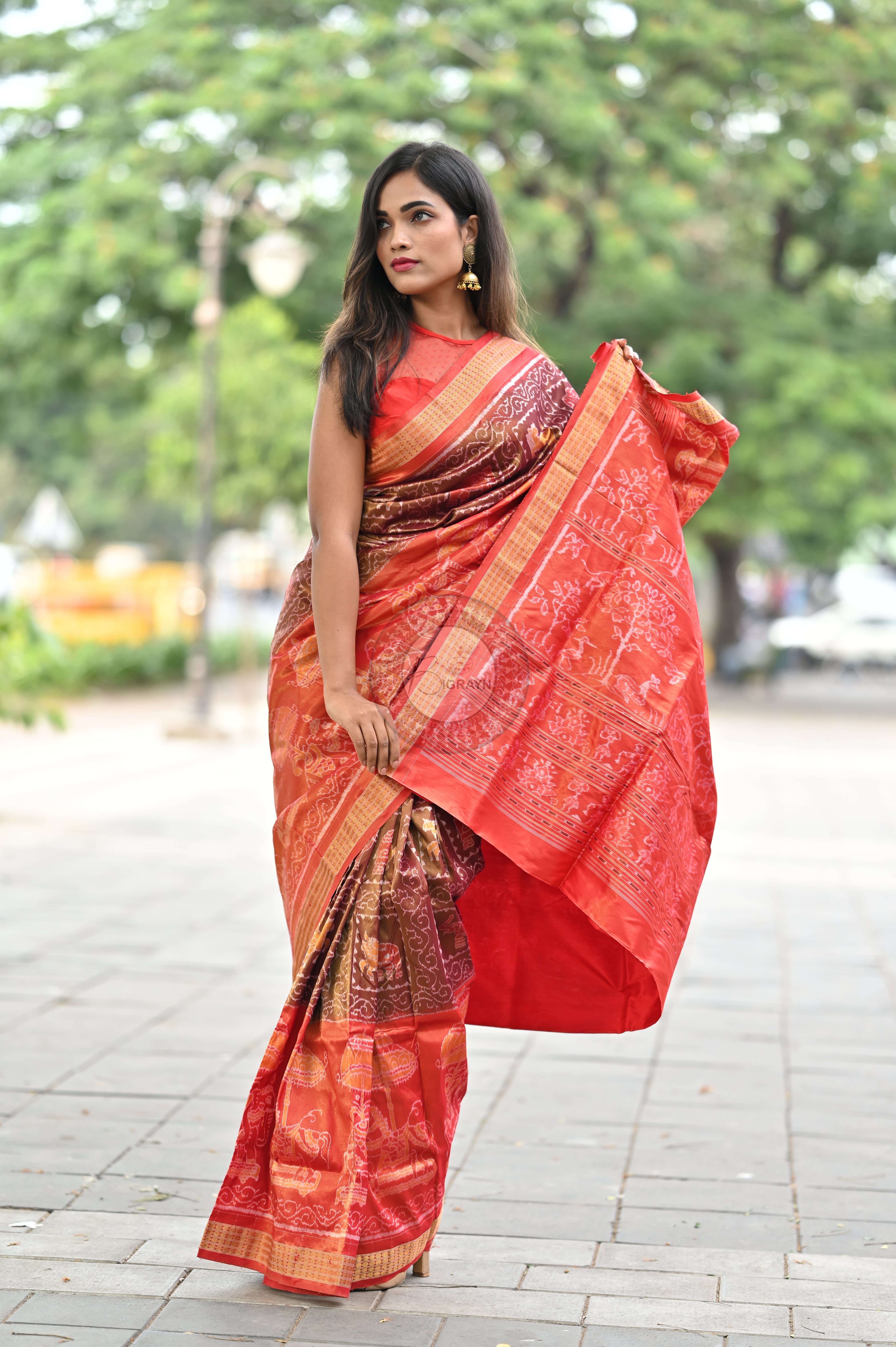 "Odisha Handloom Tissue Silk Saree with shimmering texture, elegant zari border, and lightweight drape, handcrafted by artisans"