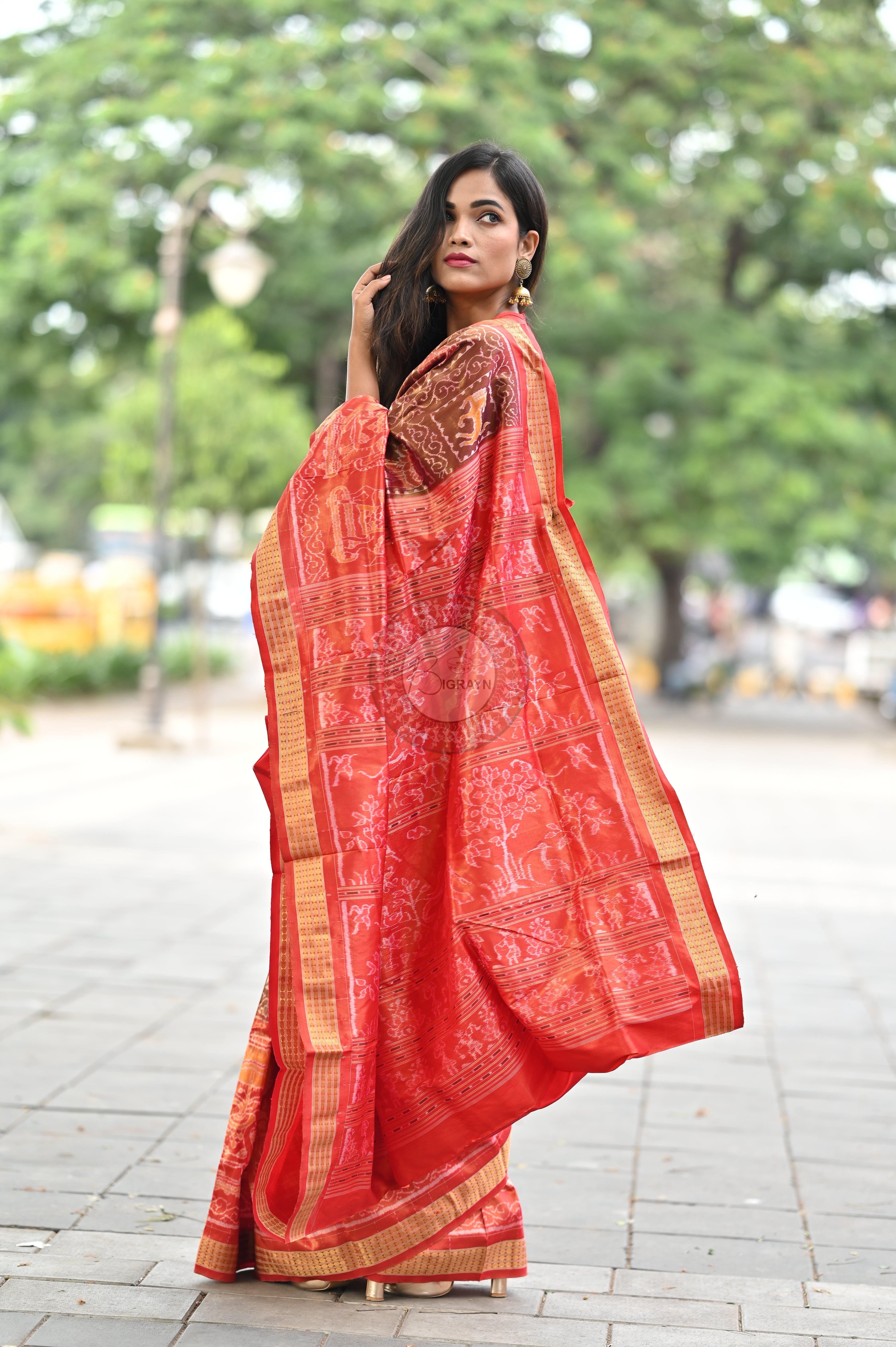 "Odisha Handloom Tissue Silk Saree with shimmering texture, elegant zari border, and lightweight drape, handcrafted by artisans"