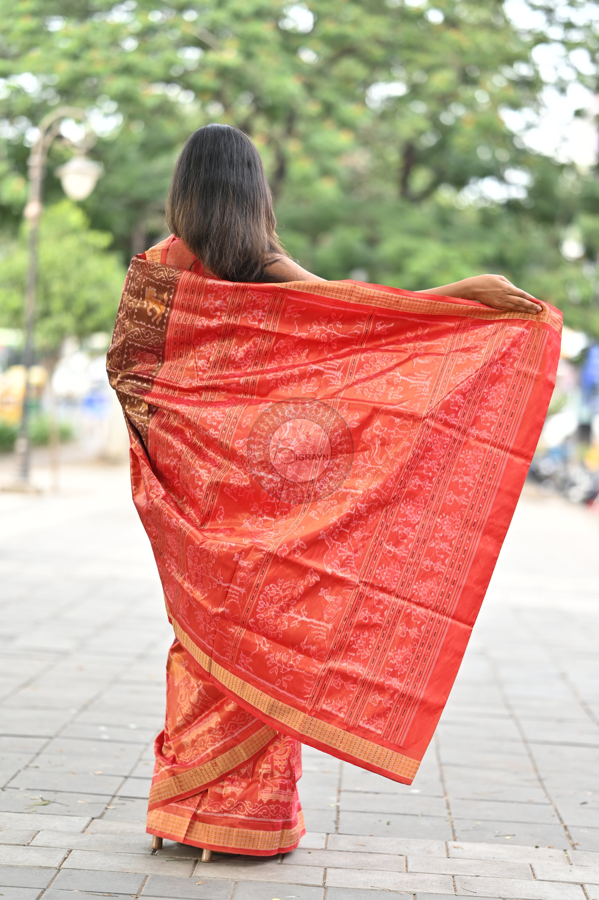 "Odisha Handloom Tissue Silk Saree with shimmering texture, elegant zari border, and lightweight drape, handcrafted by artisans"