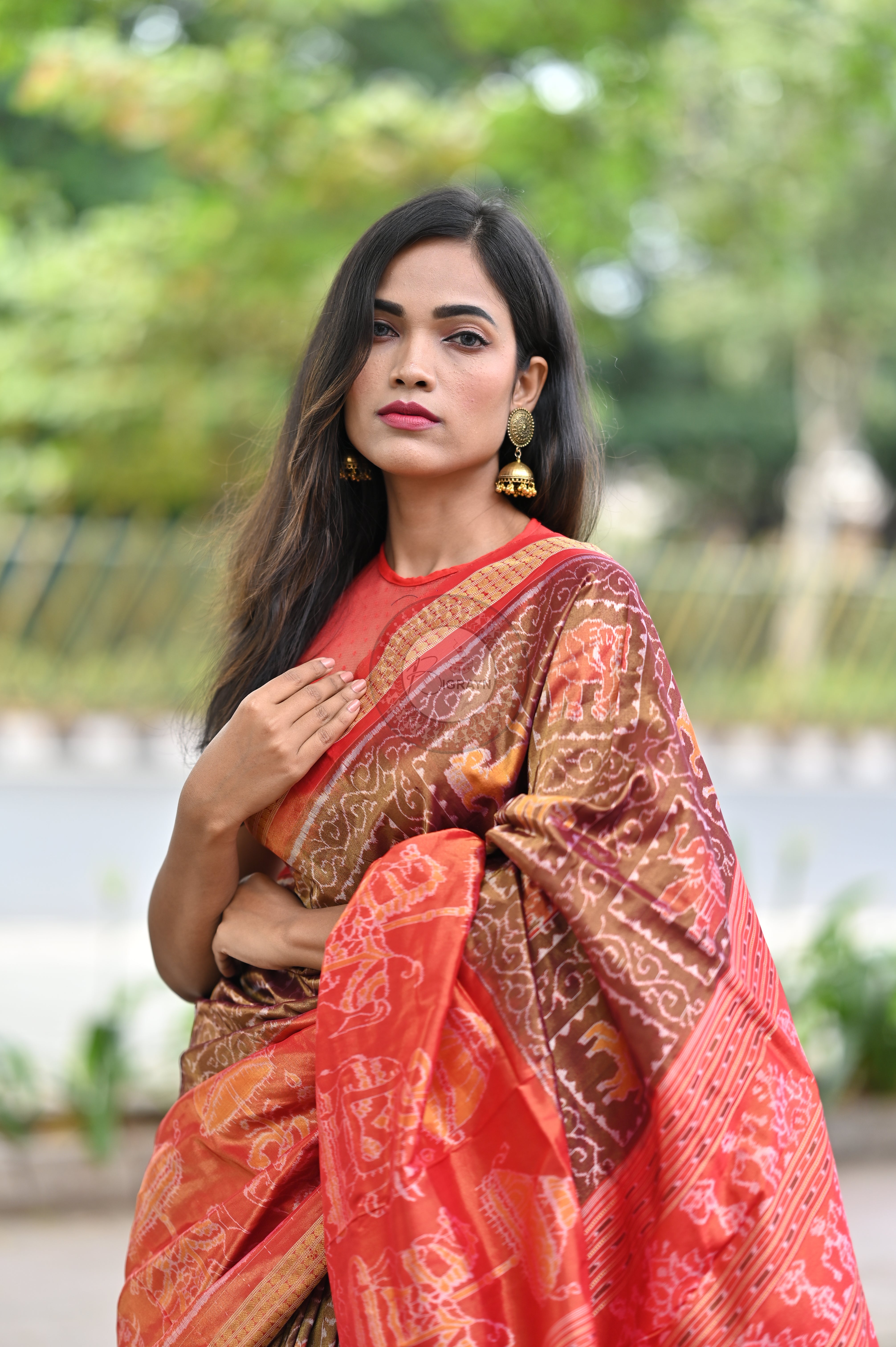 "Odisha Handloom Tissue Silk Saree with shimmering texture, elegant zari border, and lightweight drape, handcrafted by artisans"