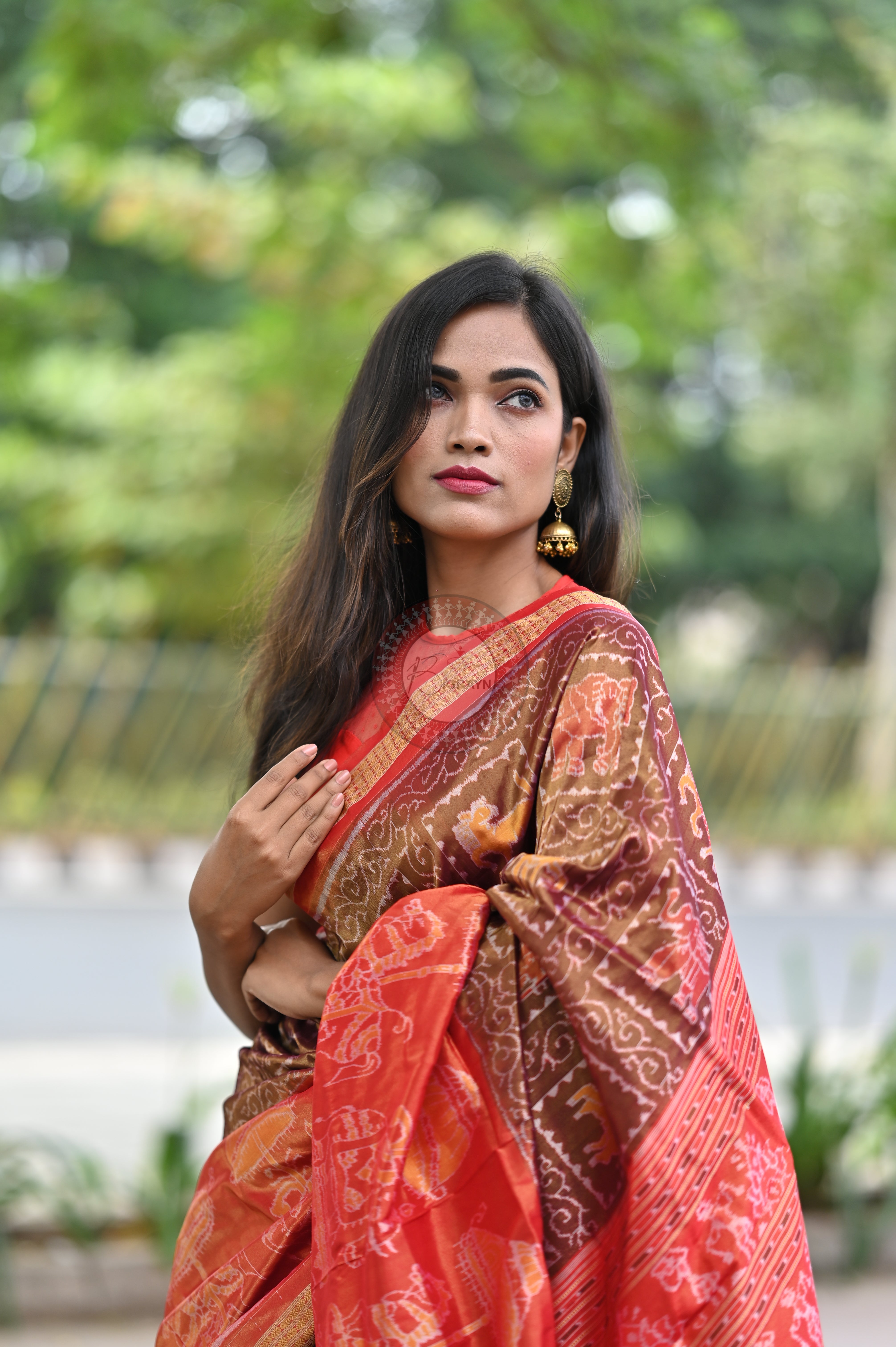 "Odisha Handloom Tissue Silk Saree with shimmering texture, elegant zari border, and lightweight drape, handcrafted by artisans"