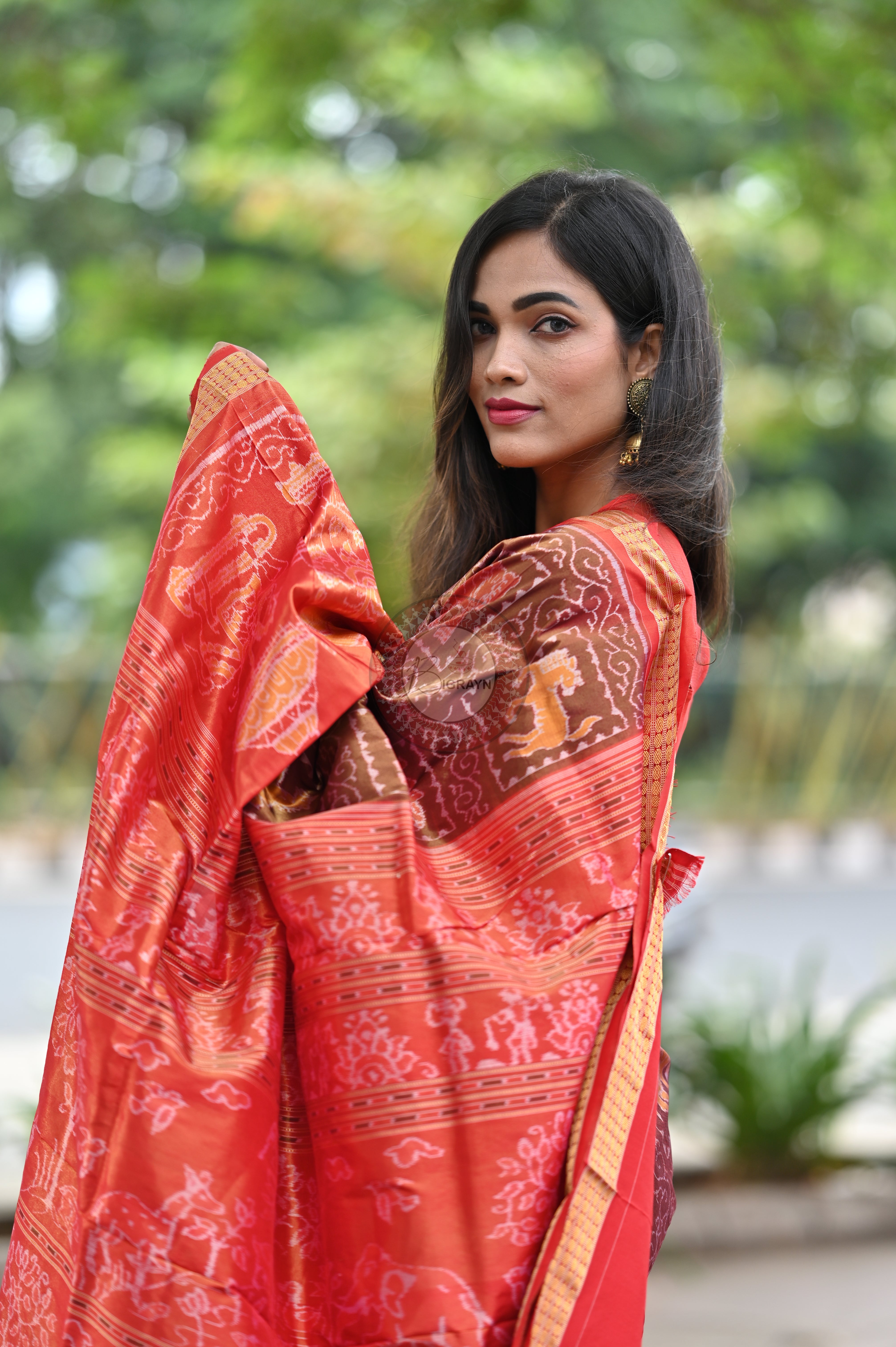 "Odisha Handloom Tissue Silk Saree with shimmering texture, elegant zari border, and lightweight drape, handcrafted by artisans"
