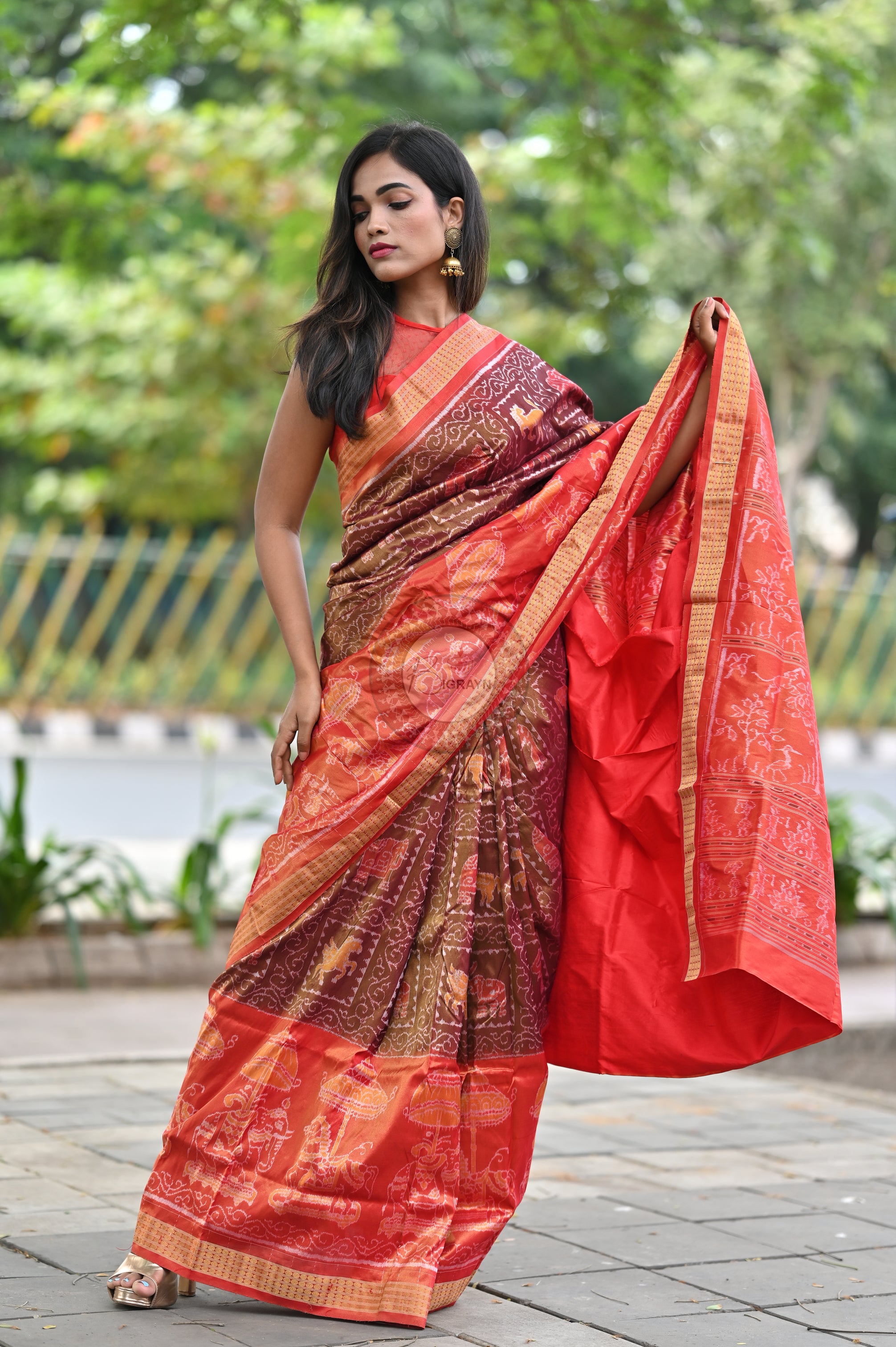 "Odisha Handloom Tissue Silk Saree with shimmering texture, elegant zari border, and lightweight drape, handcrafted by artisans"