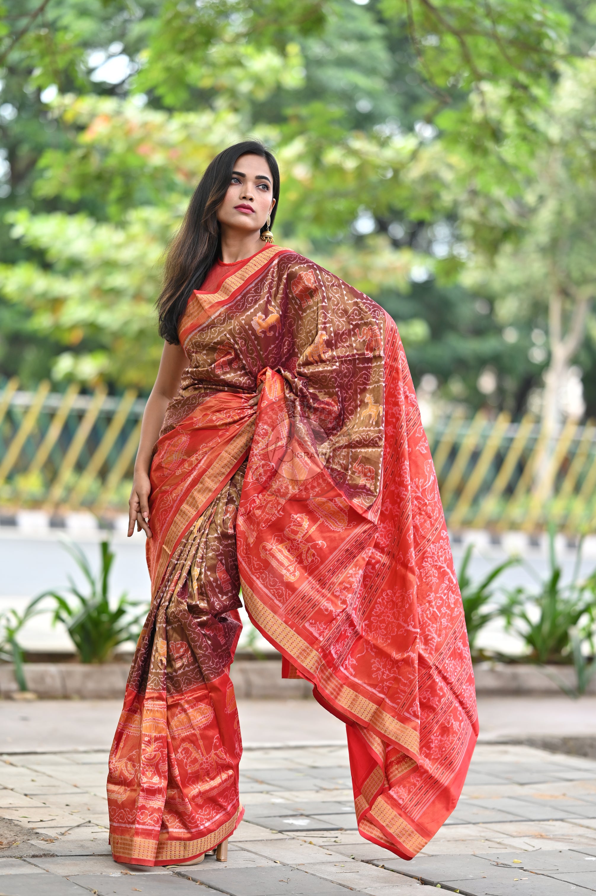 "Odisha Handloom Tissue Silk Saree with shimmering texture, elegant zari border, and lightweight drape, handcrafted by artisans"