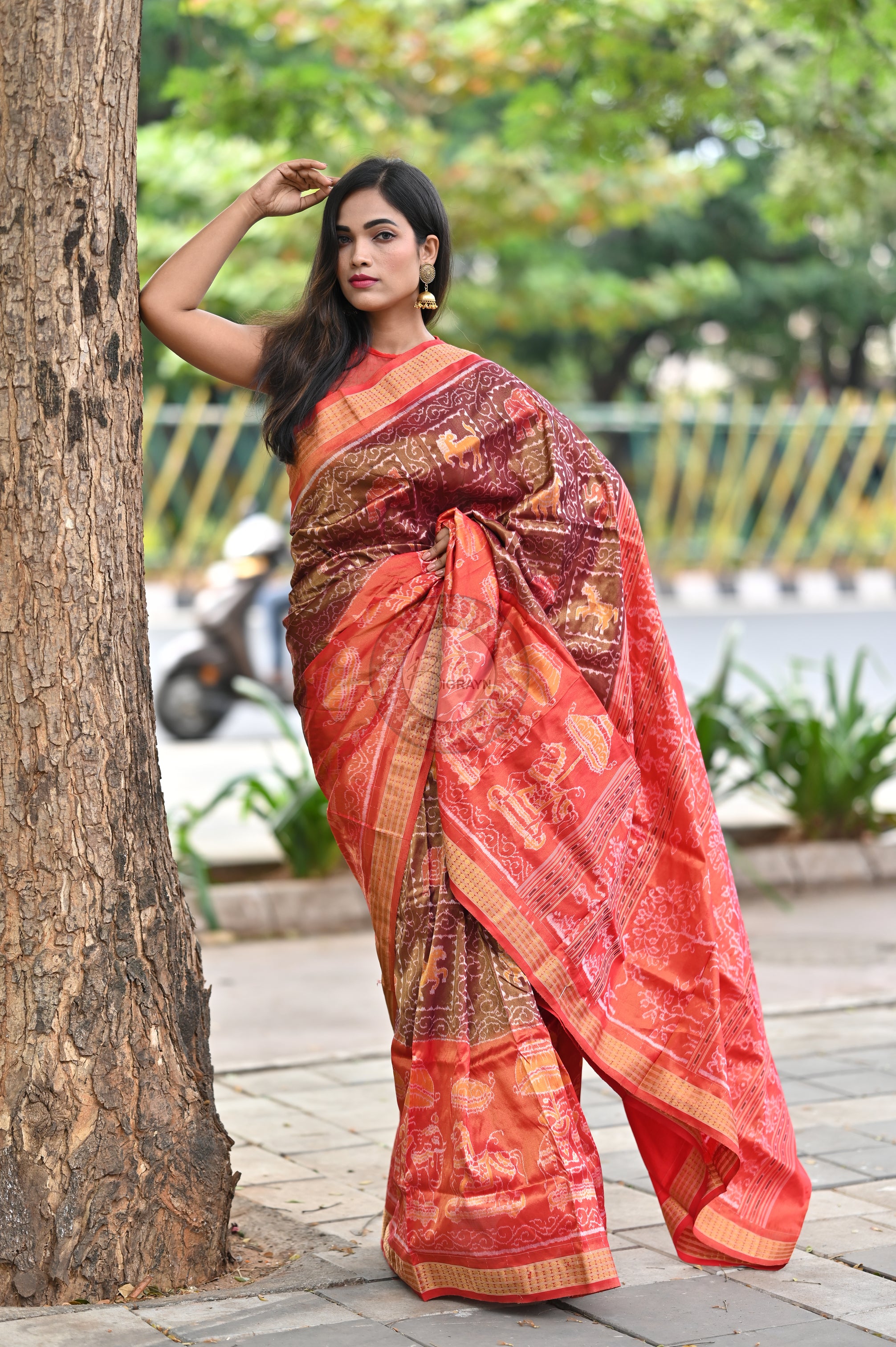 "Odisha Handloom Tissue Silk Saree with shimmering texture, elegant zari border, and lightweight drape, handcrafted by artisans"